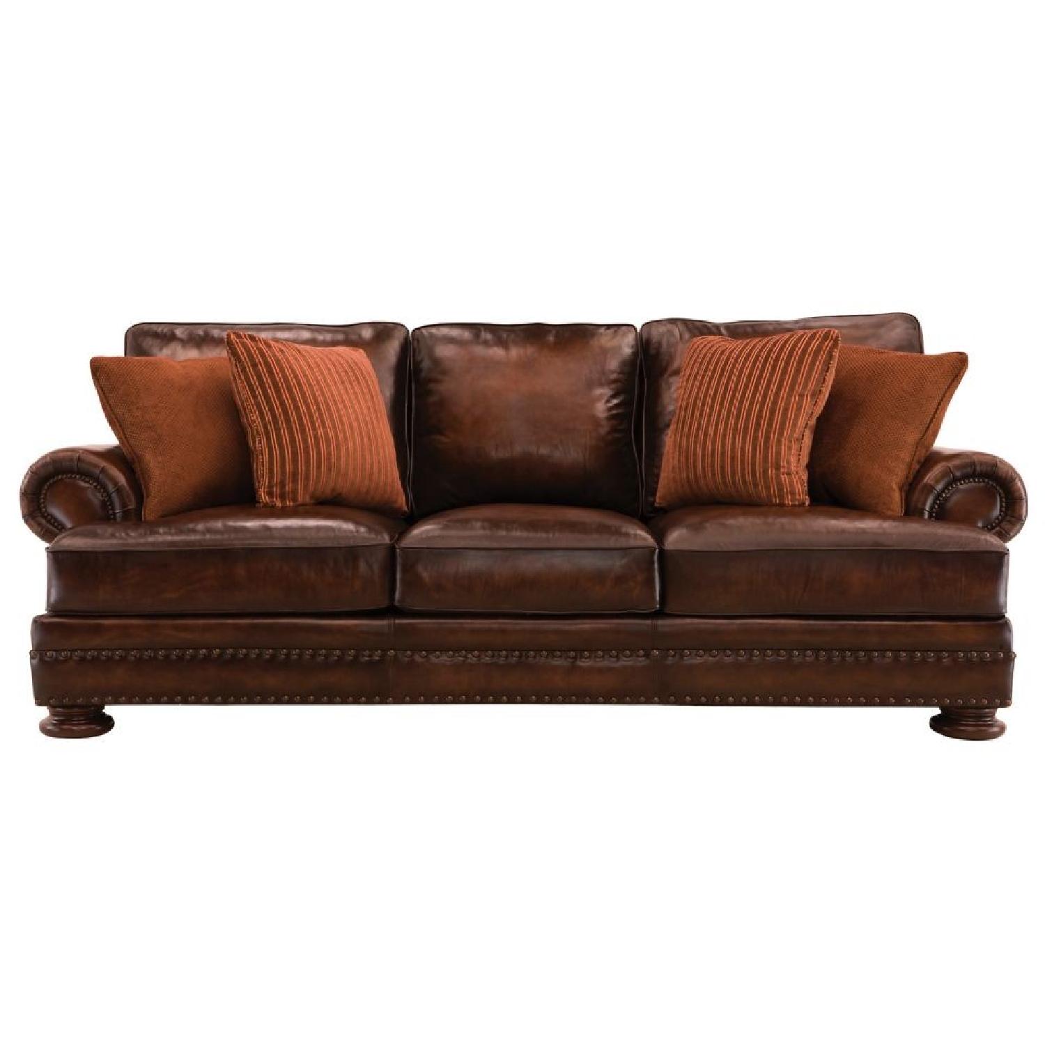 Raymour & Flanigan Leather Sofa + Armchair & Ottoman AptDeco