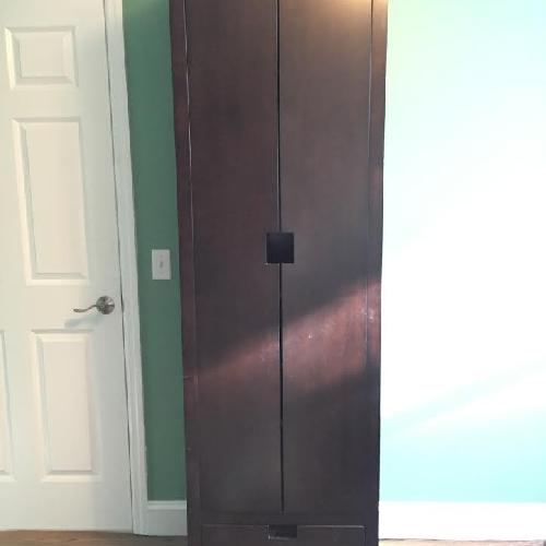 Used The Door Store Sleek Wooden Armoire in Espresso for sale on AptDeco