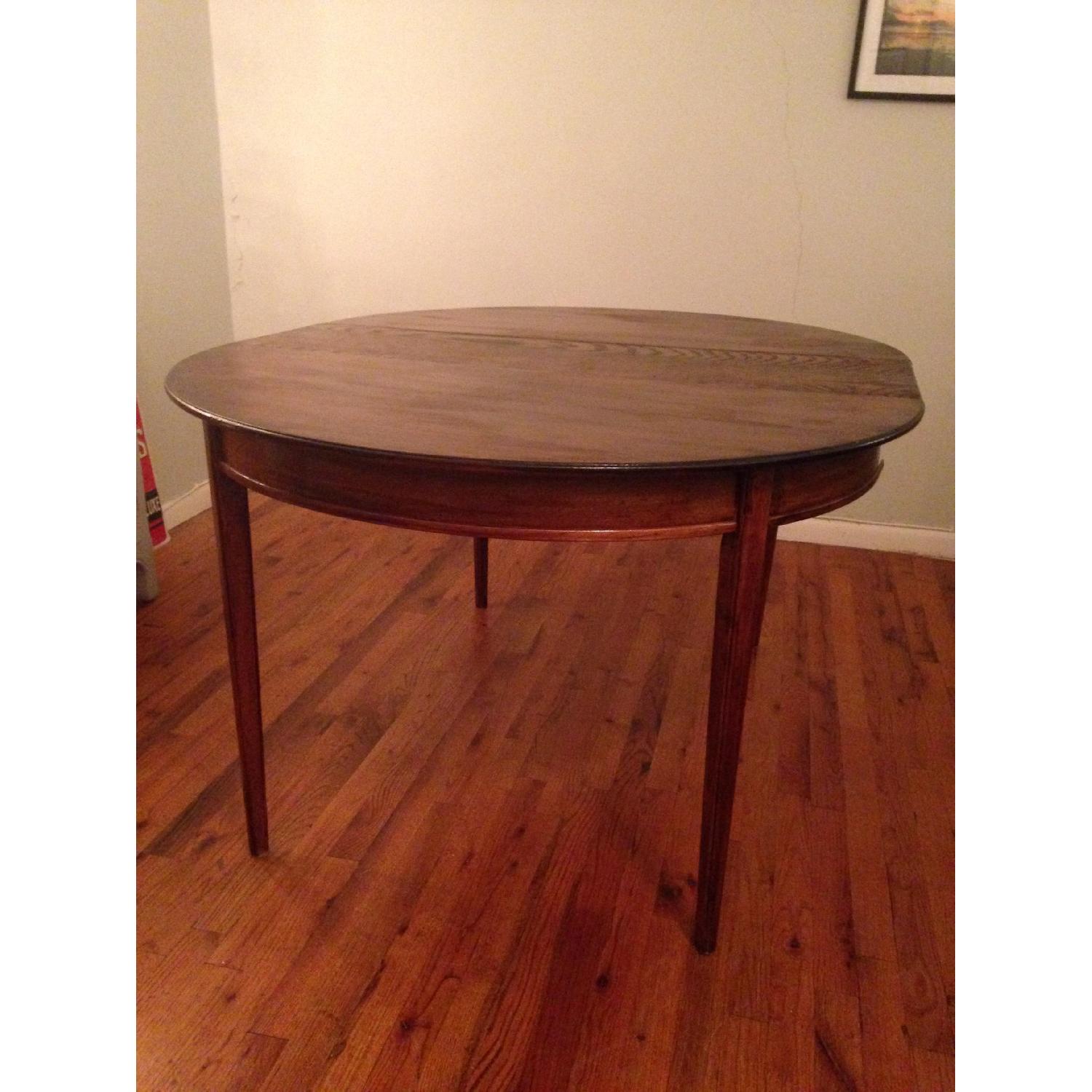 Dark Vintage Extendable Round Dining Table - image-1