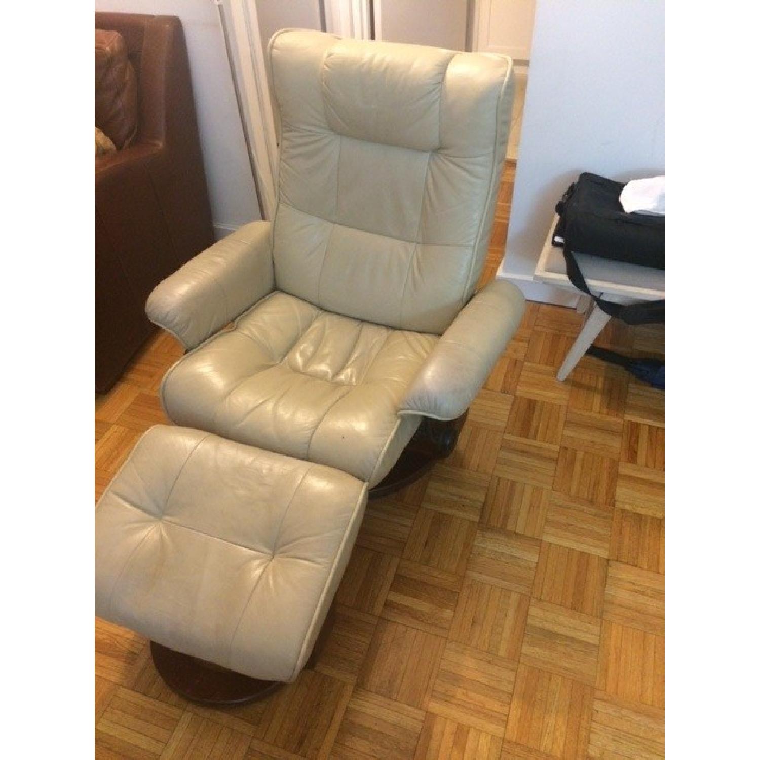 Raymour & Flanigan Reclining Chair & Ottoman AptDeco