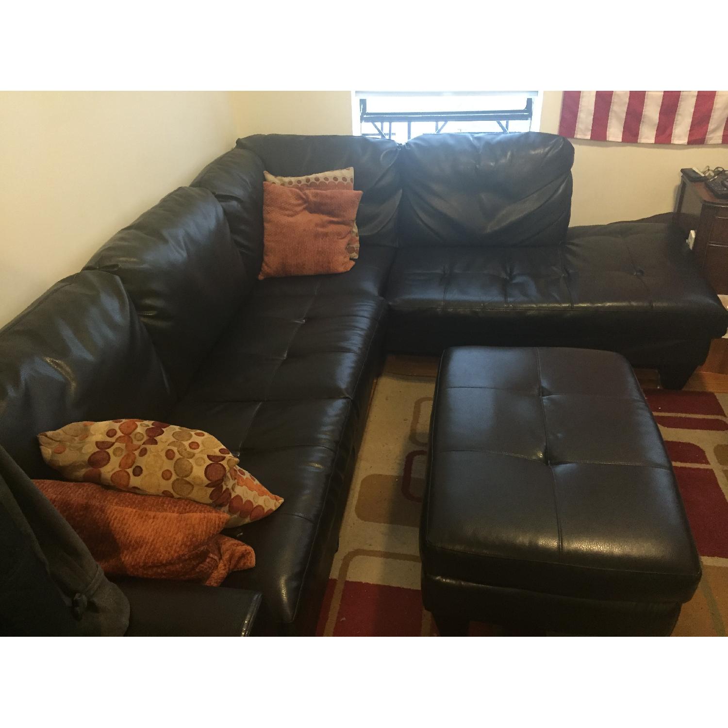 Jennifer Convertibles Leather Sectional Sofa & Ottoman AptDeco