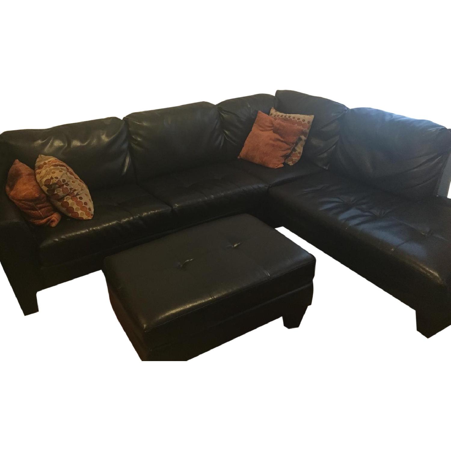 Jennifer Convertibles Leather Sectional Sofa & Ottoman AptDeco