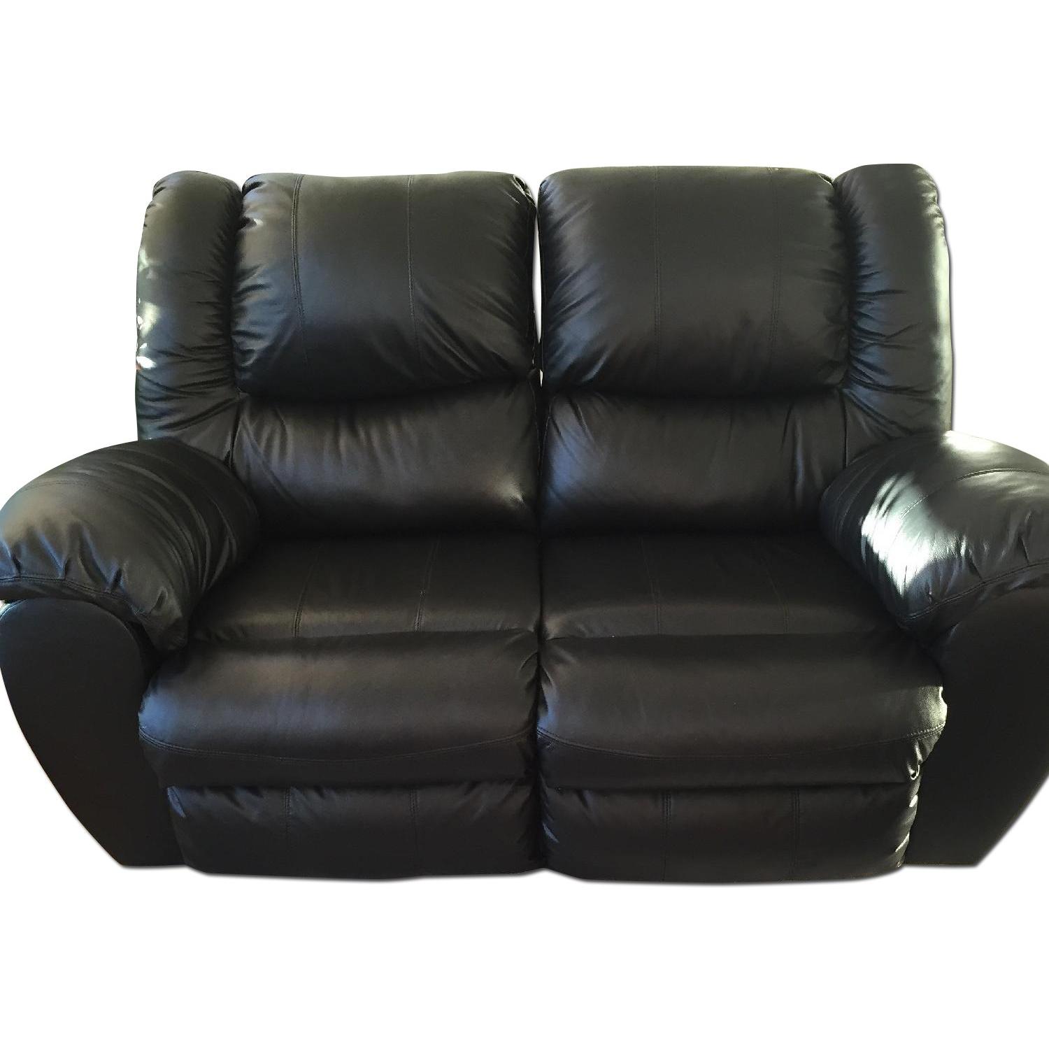 Ashley's Black Leather Recliner Loveseat - image-0