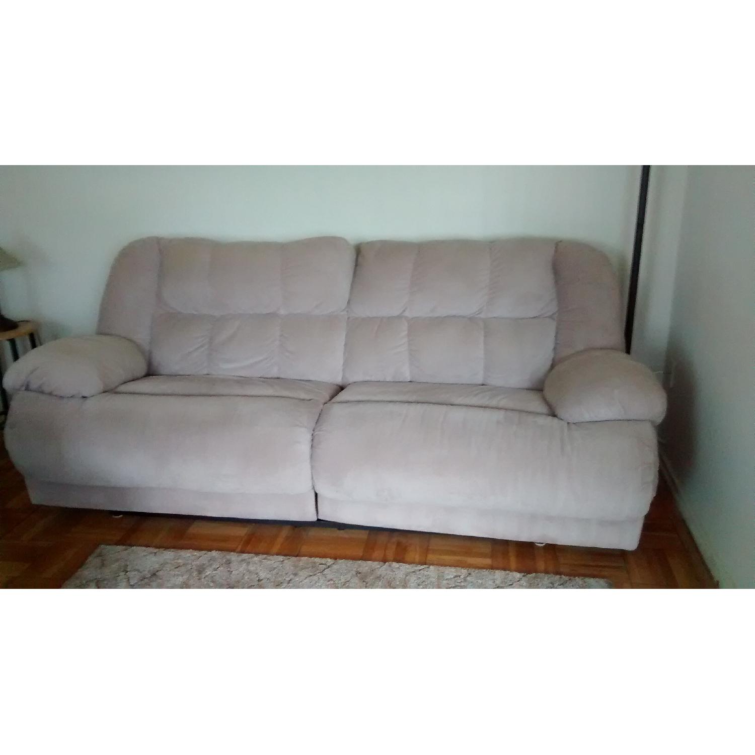Ashley's Taddy Reclining Sofa - image-1