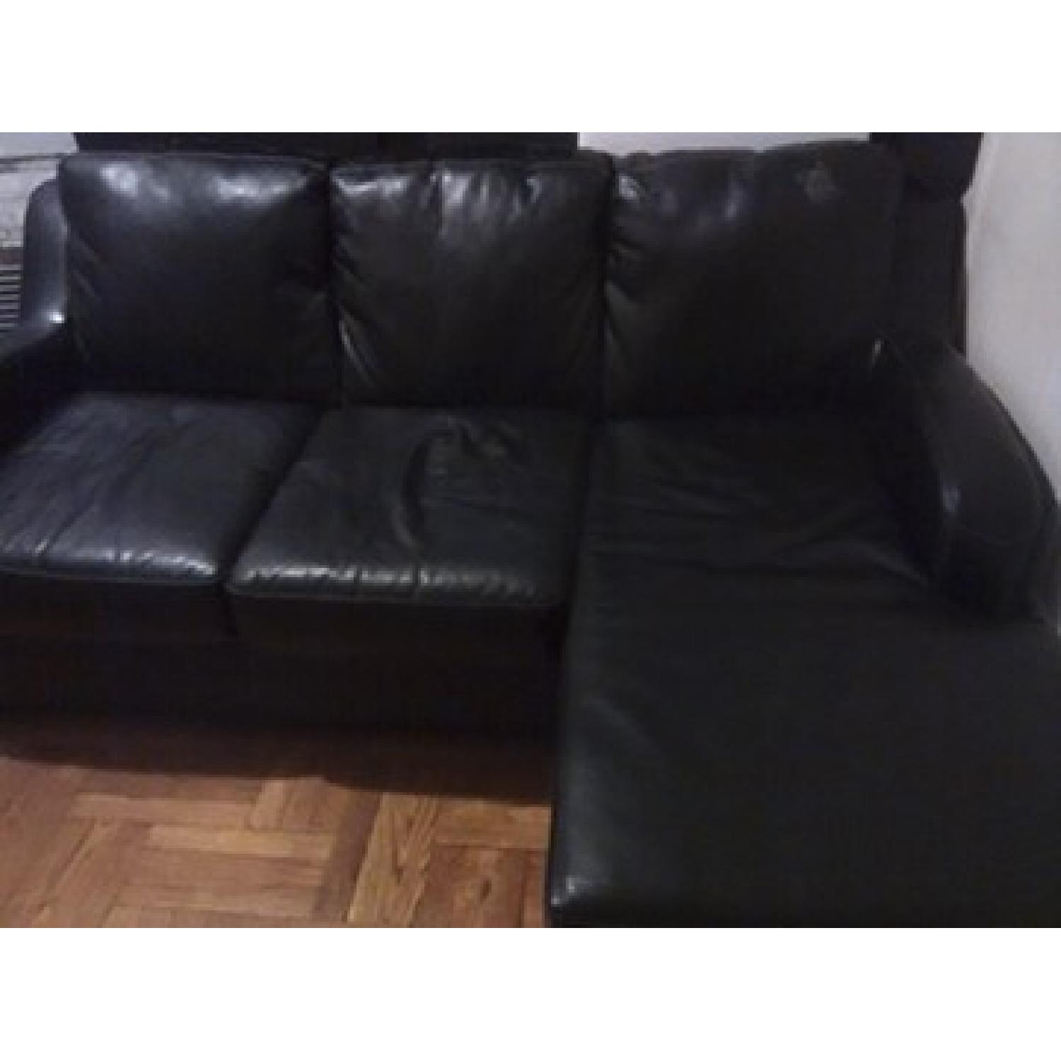 Ashley's Signature Design Devin Durablend Sectional Sofa - image-3