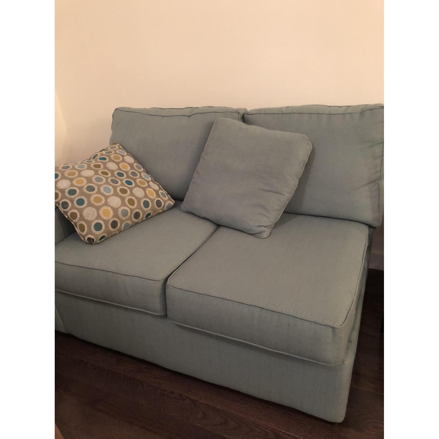 Jennifer Convertibles Aqua Green Sectional Sofa & Ottoman - image-7