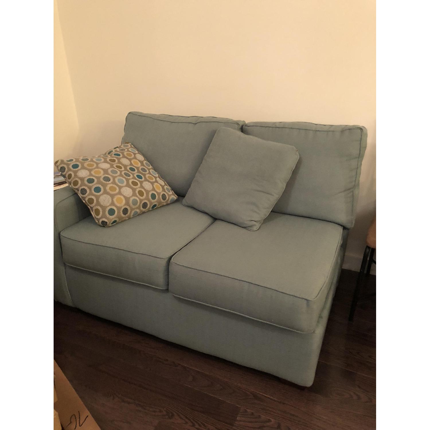 Jennifer Convertibles Aqua Green Sectional Sofa & Ottoman - image-11