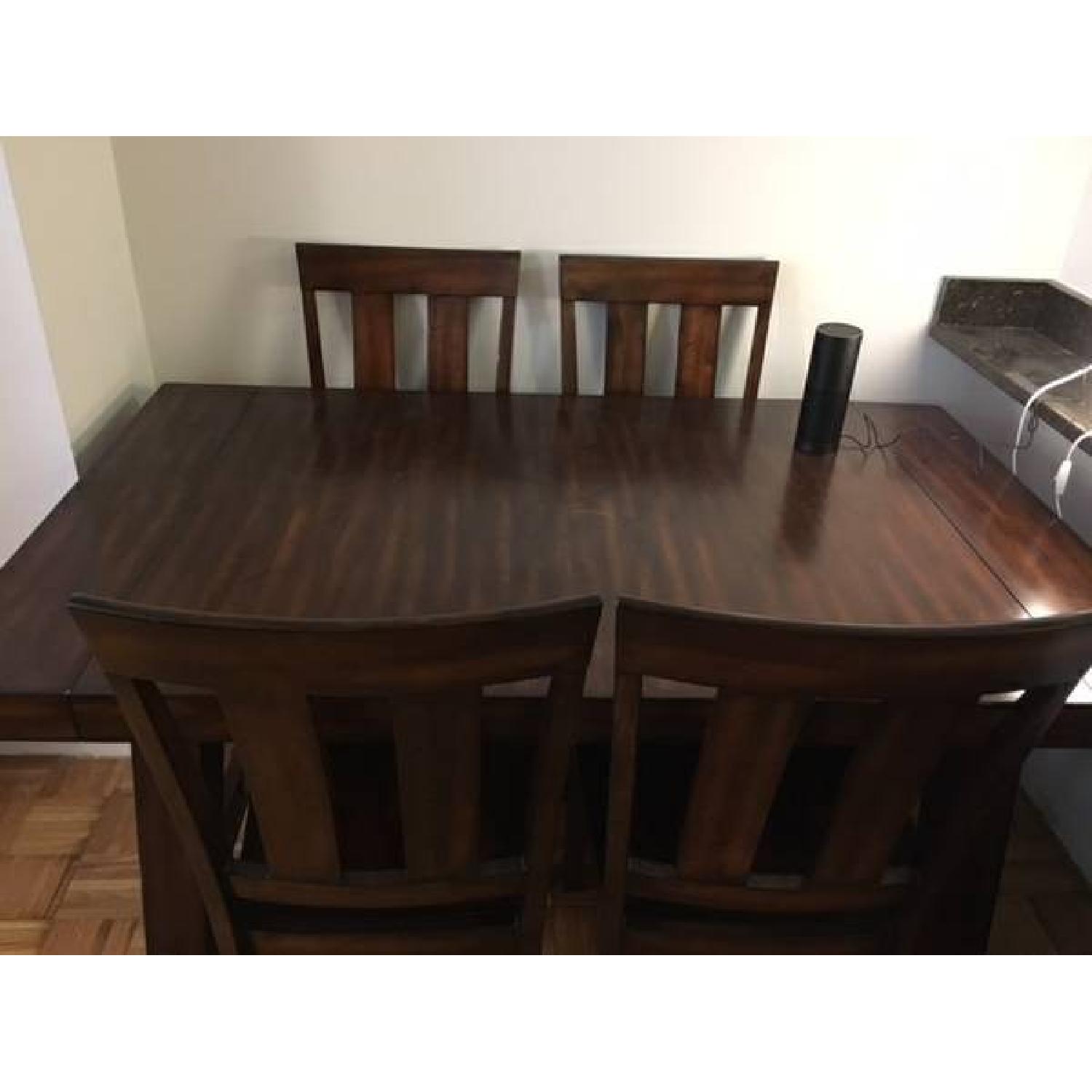 Solid Oak Dining Table w/ 4 Chairs - AptDeco