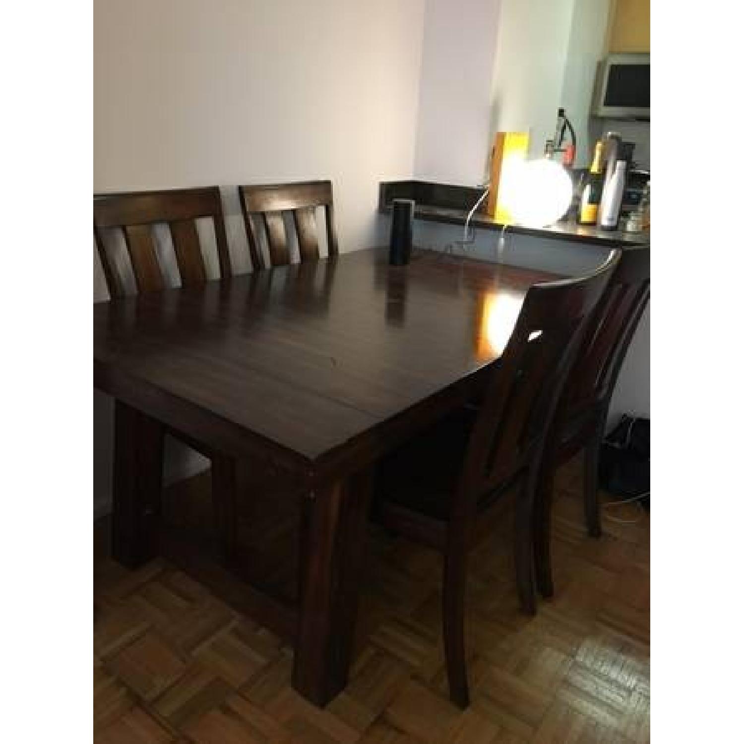 Solid Oak Dining Table w/ 4 Chairs - AptDeco