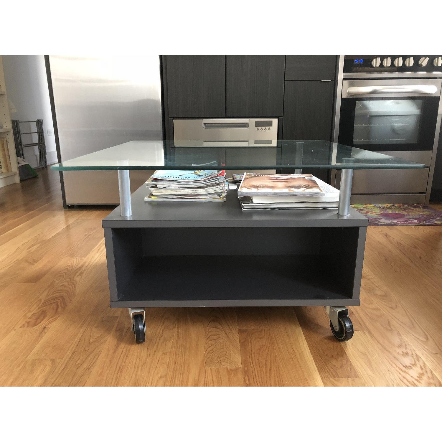 Ikea Wood & Glass Coffee Table w/ Storage on Wheels AptDeco