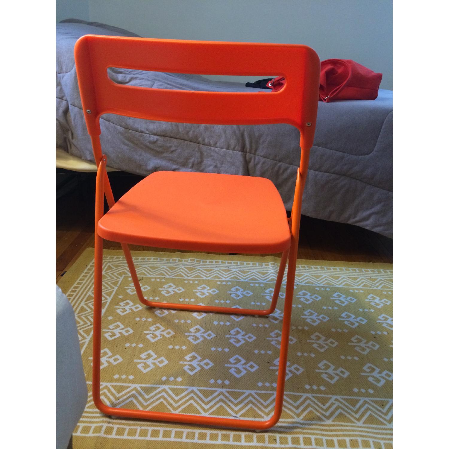 Ikea Orange Folding Chair - AptDeco