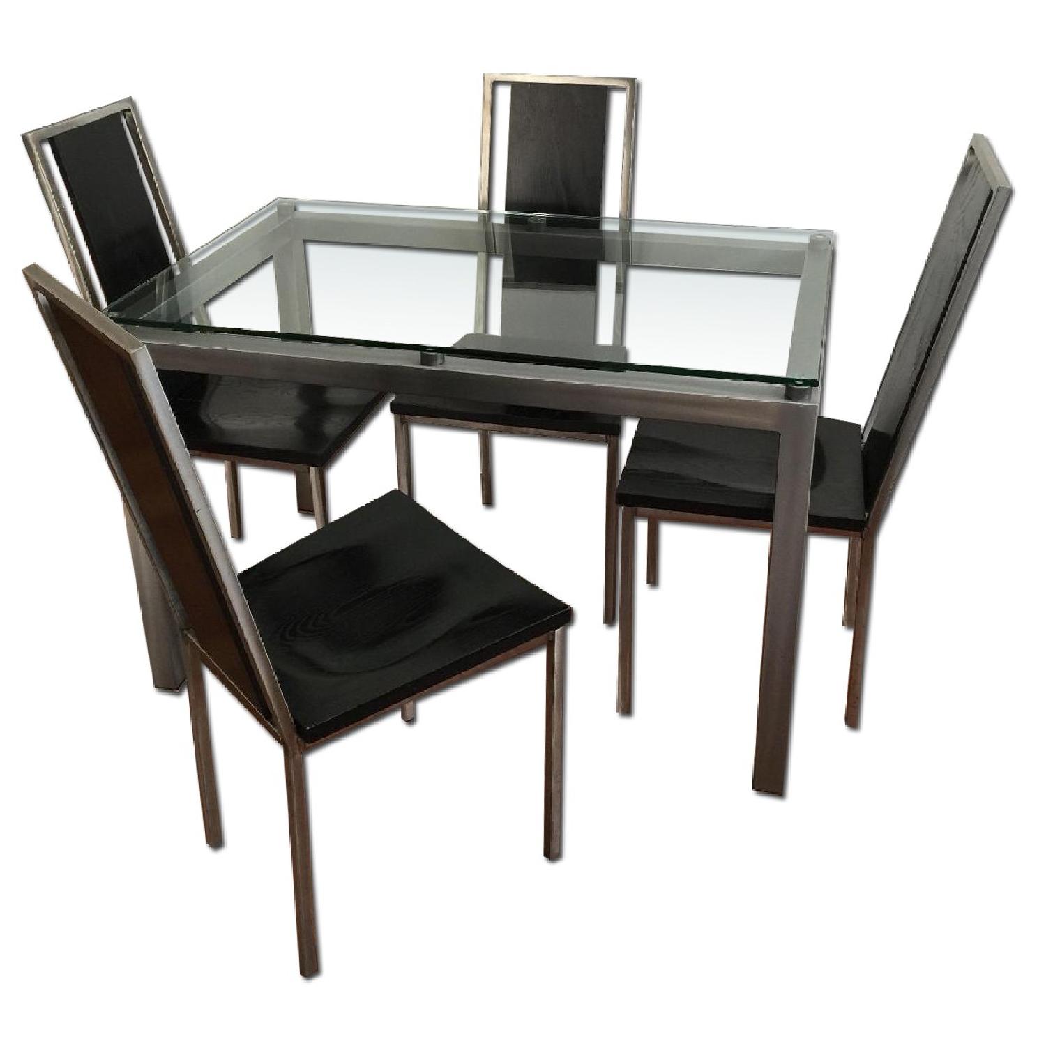 Glass Top/Stainless Base Parsons Table w/ 4 Black Ash Wood Chairs - image-0
