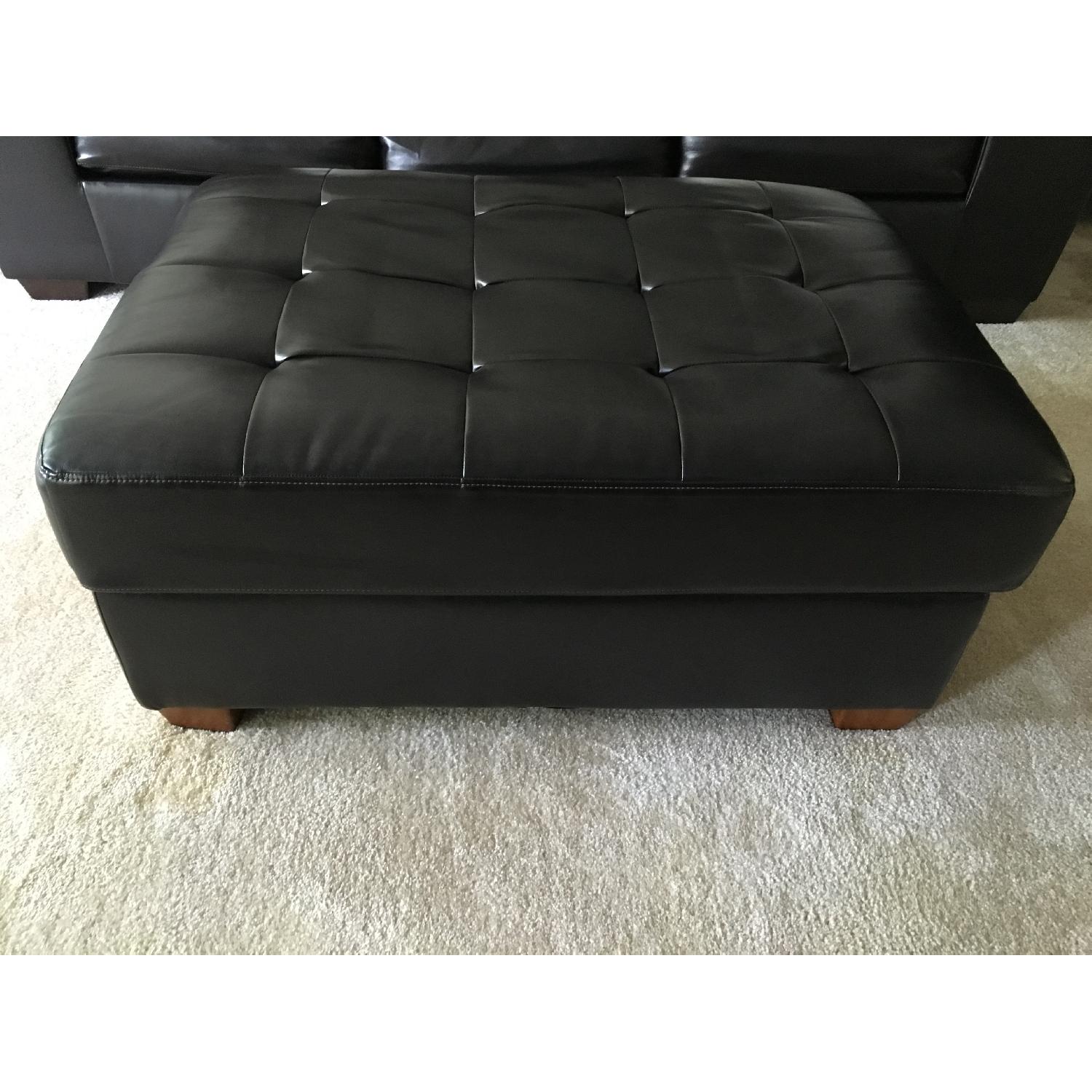 Ashley's Leather Ottoman w/ Storage - image-1