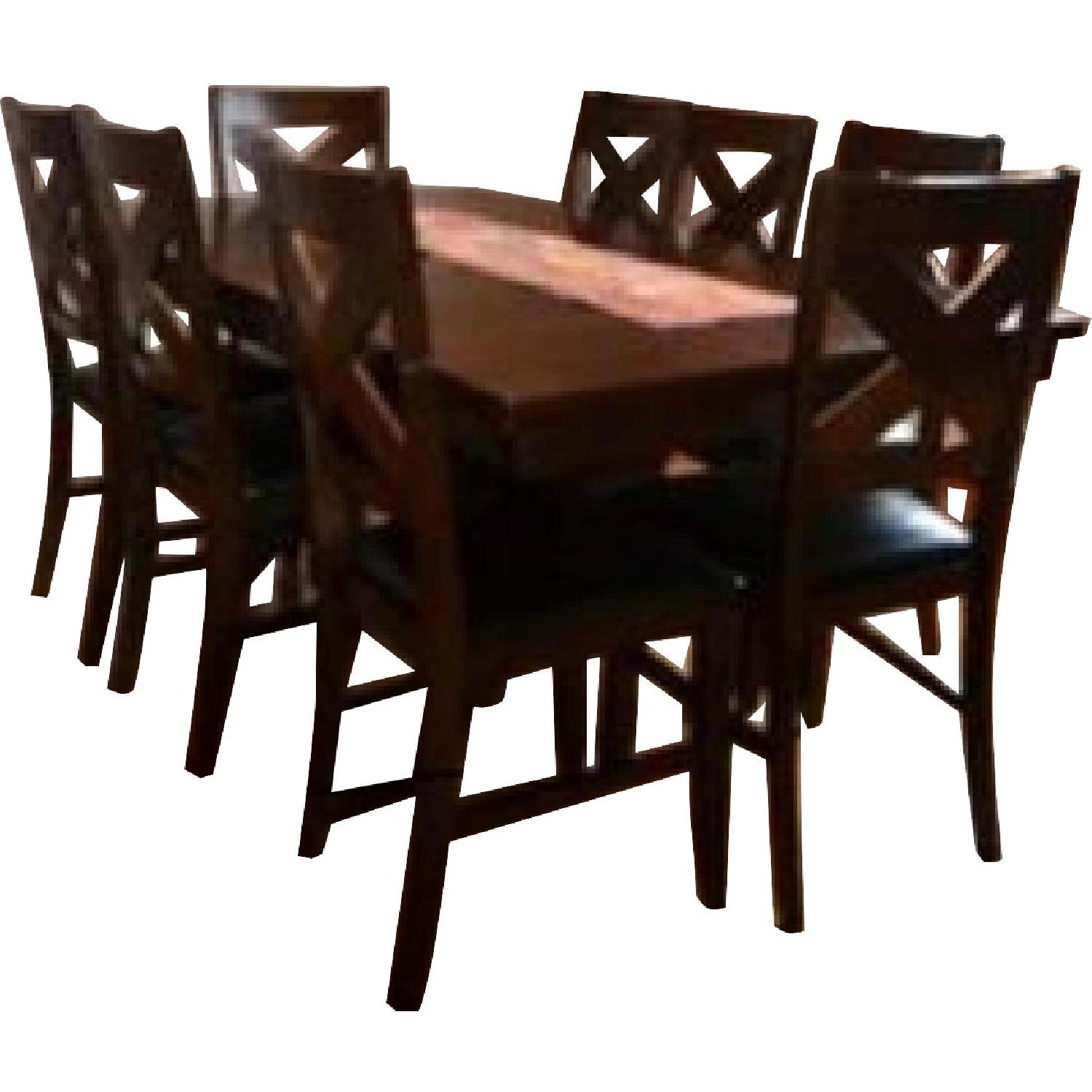 Bob's Wooden Dining Table w/ 8 Cushioned Chairs - AptDeco