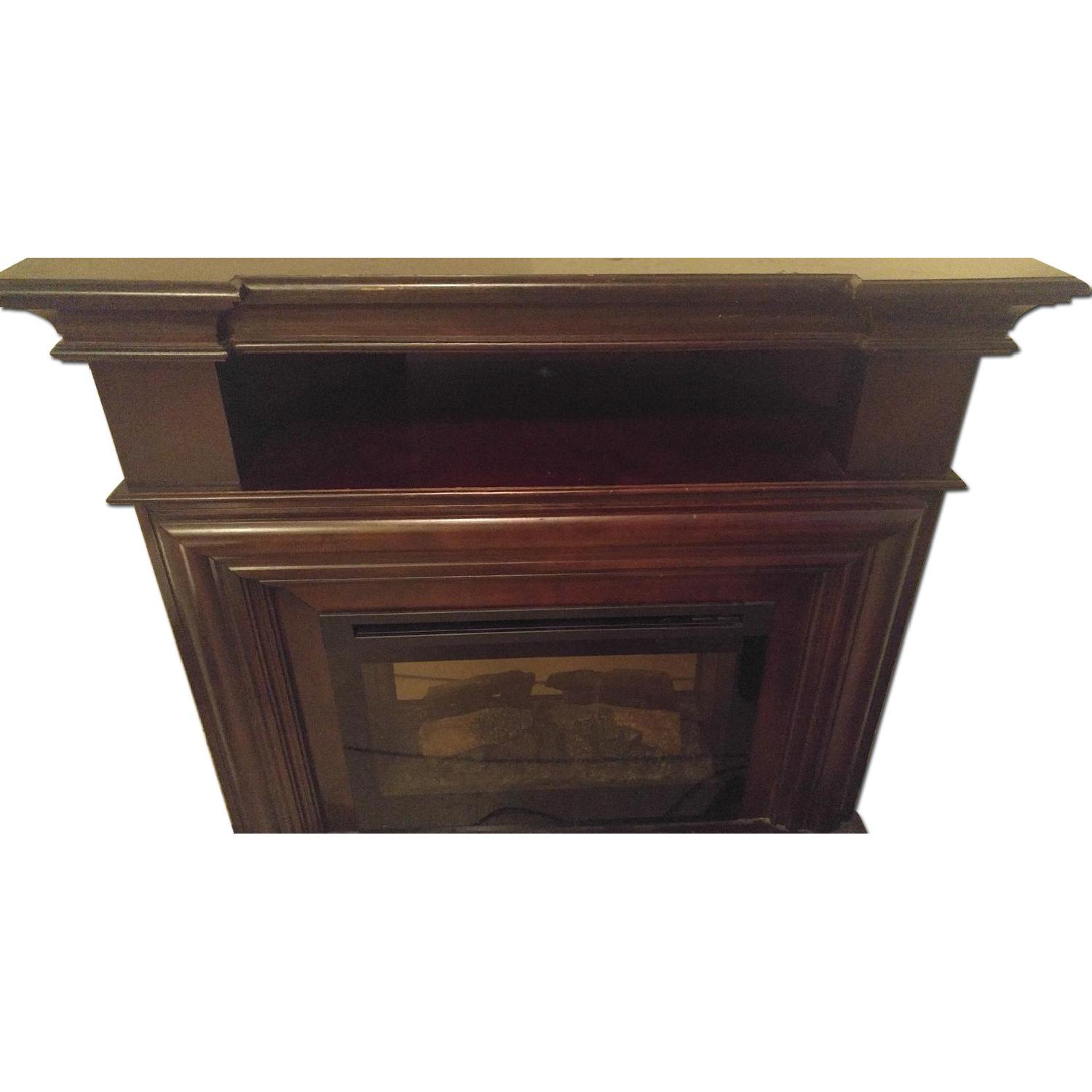 Raymour & Flanigan Burgundy Corner Fireplace & TV Console AptDeco
