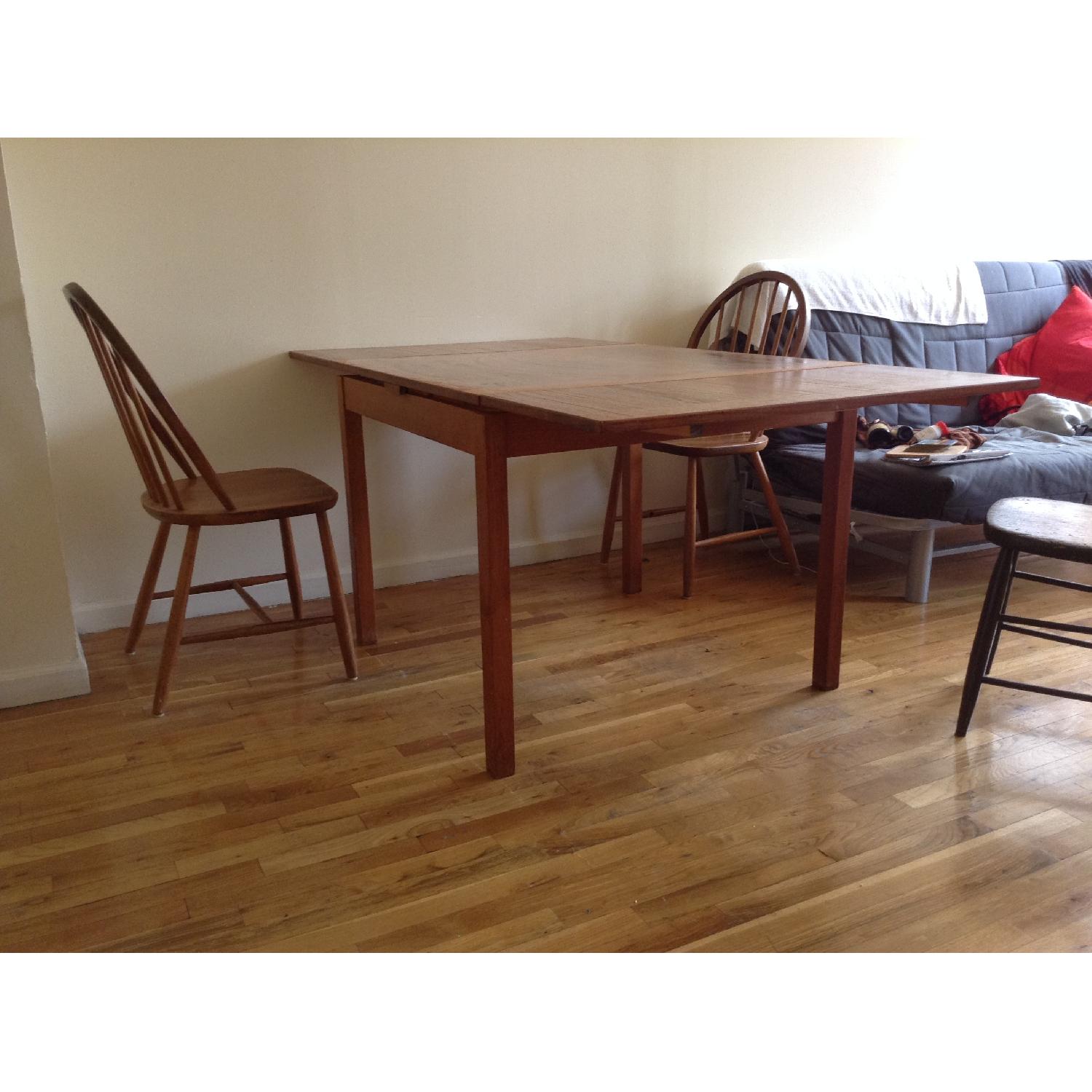 Vintage Hardwood Dining Table with Double Leaf Extensions - AptDeco