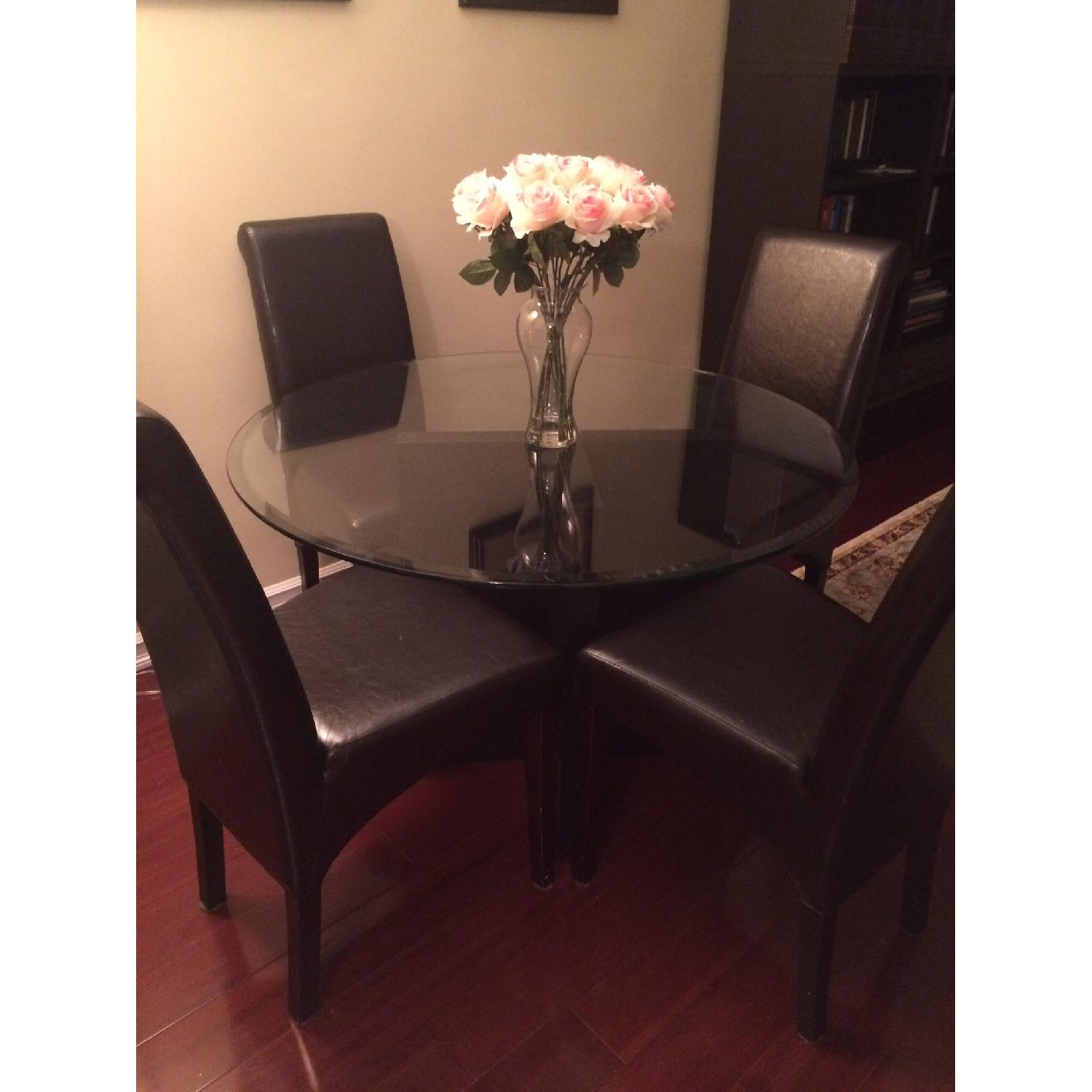 Glass Dining Table w/ 4 Leather Chairs - AptDeco