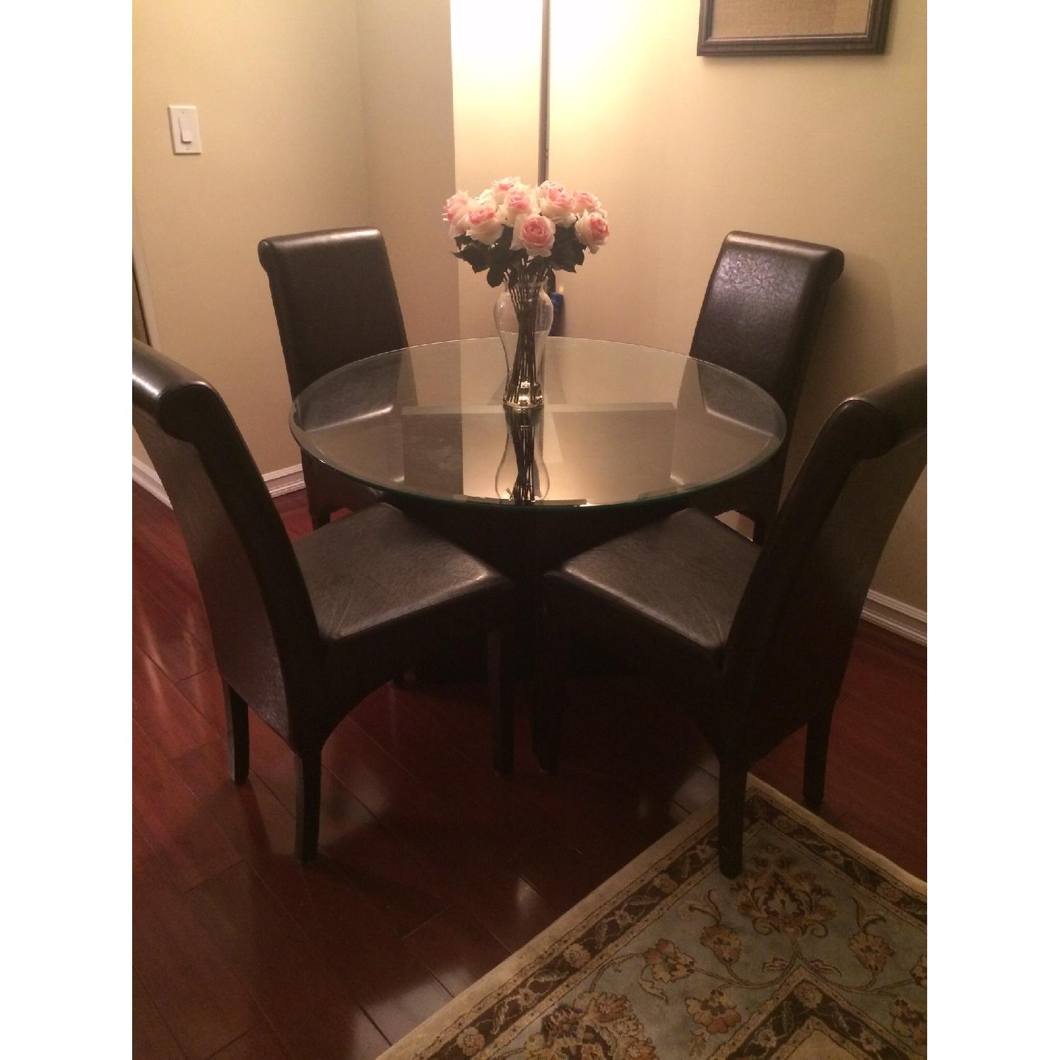 Glass Dining Table w/ 4 Leather Chairs - AptDeco