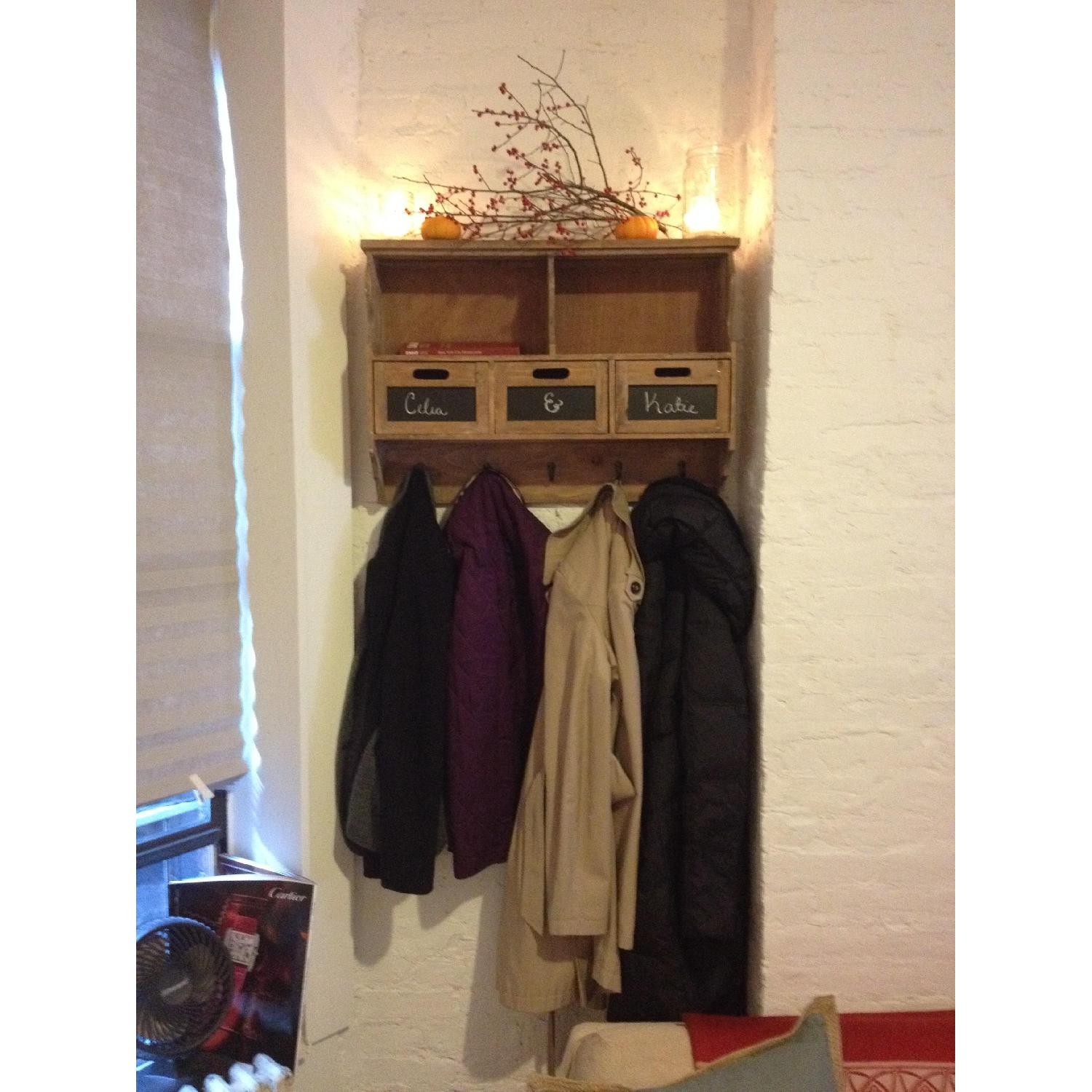 HomeGoods Hanging Coat Rack w/ Storage Drawers AptDeco