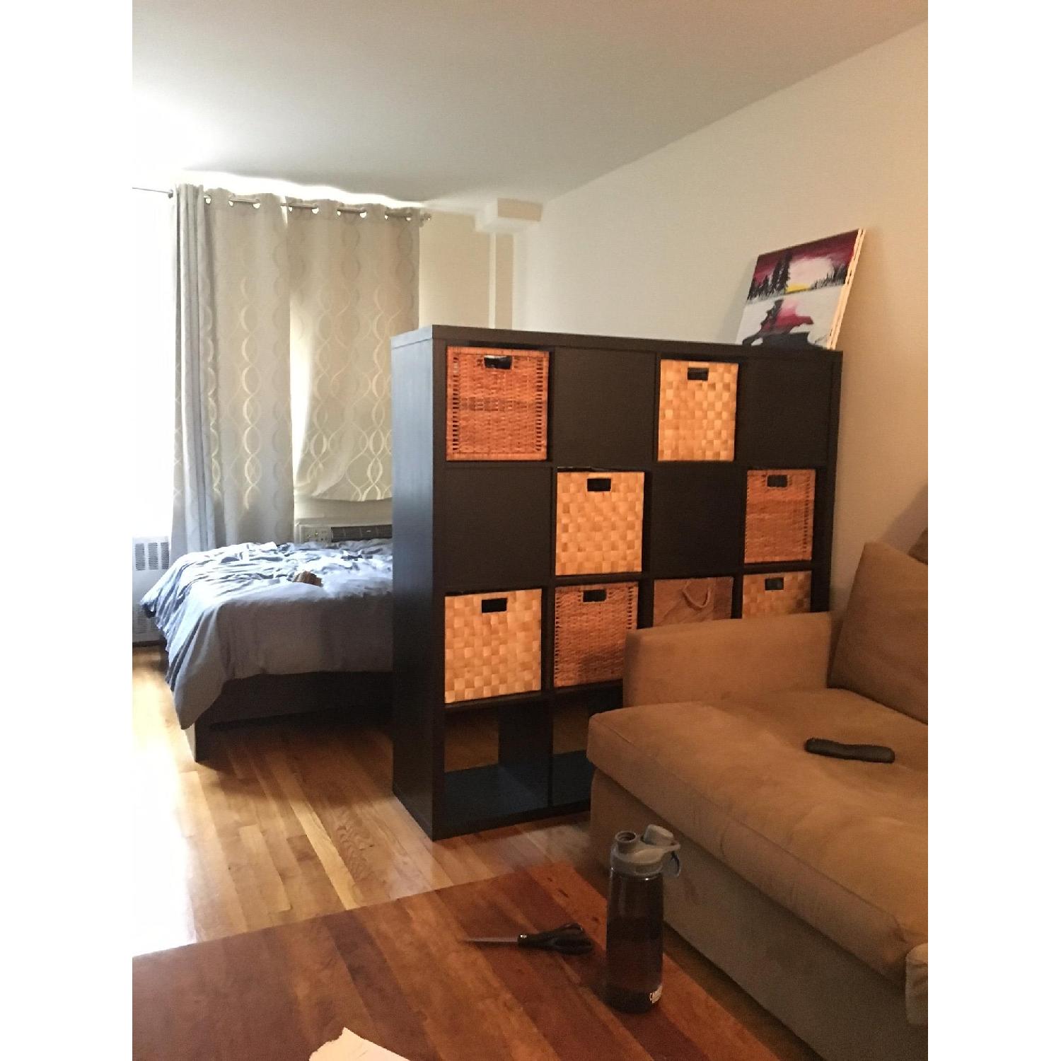 Ikea Kallax Shelving Unit w/ Drawers & Baskets AptDeco