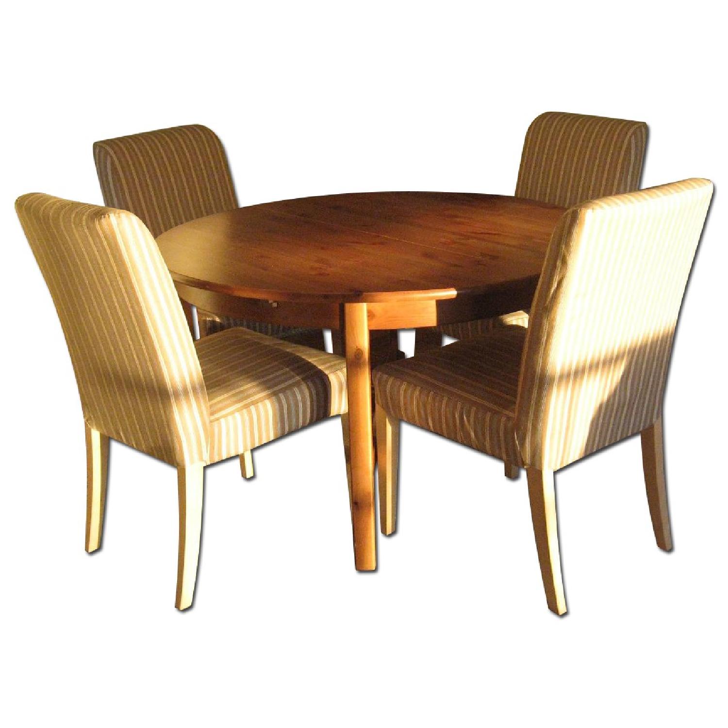 Ikea Extendable Round Table w/ 4 Upholstered Chairs AptDeco