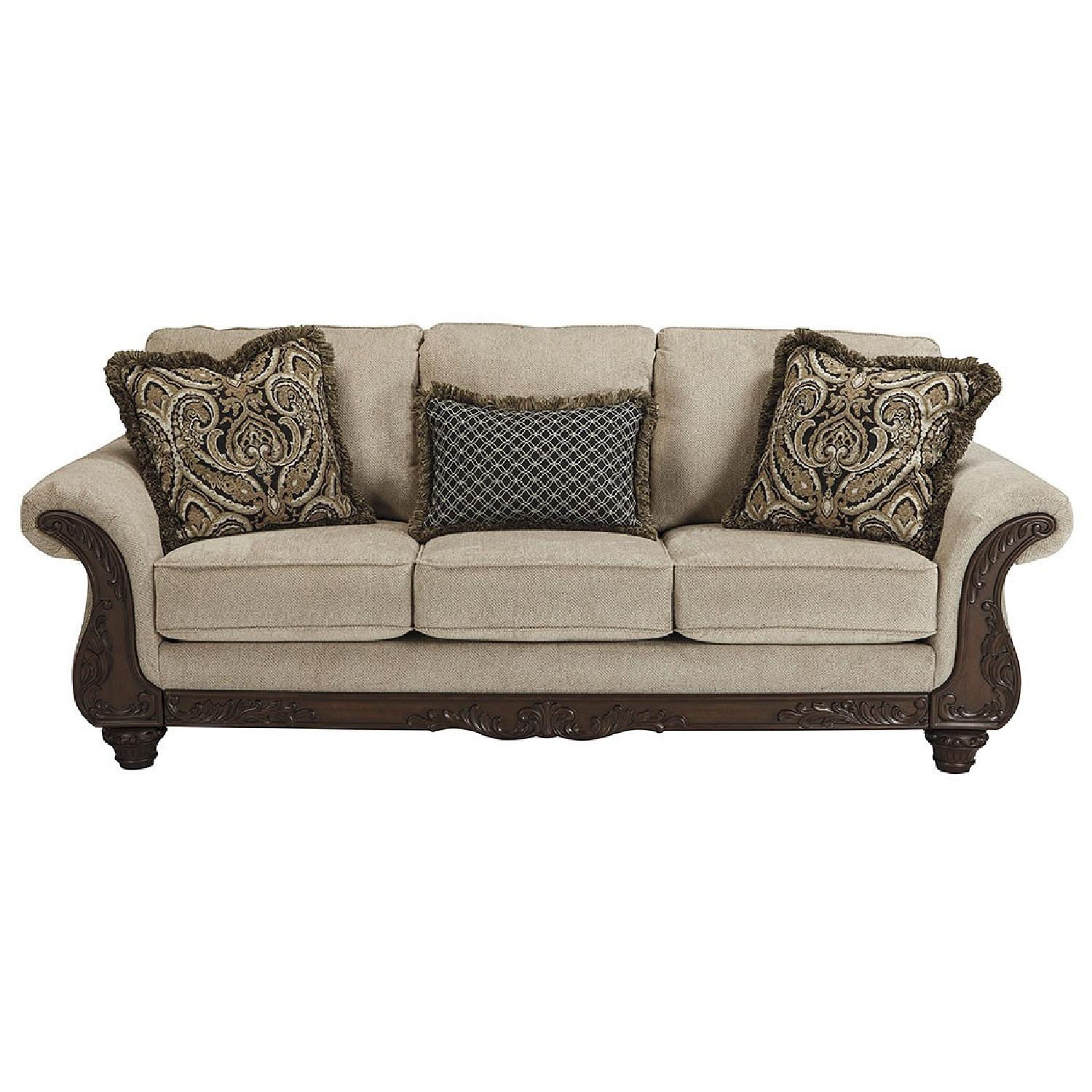 Signature Design Pebble Wood Trim Sofa AptDeco