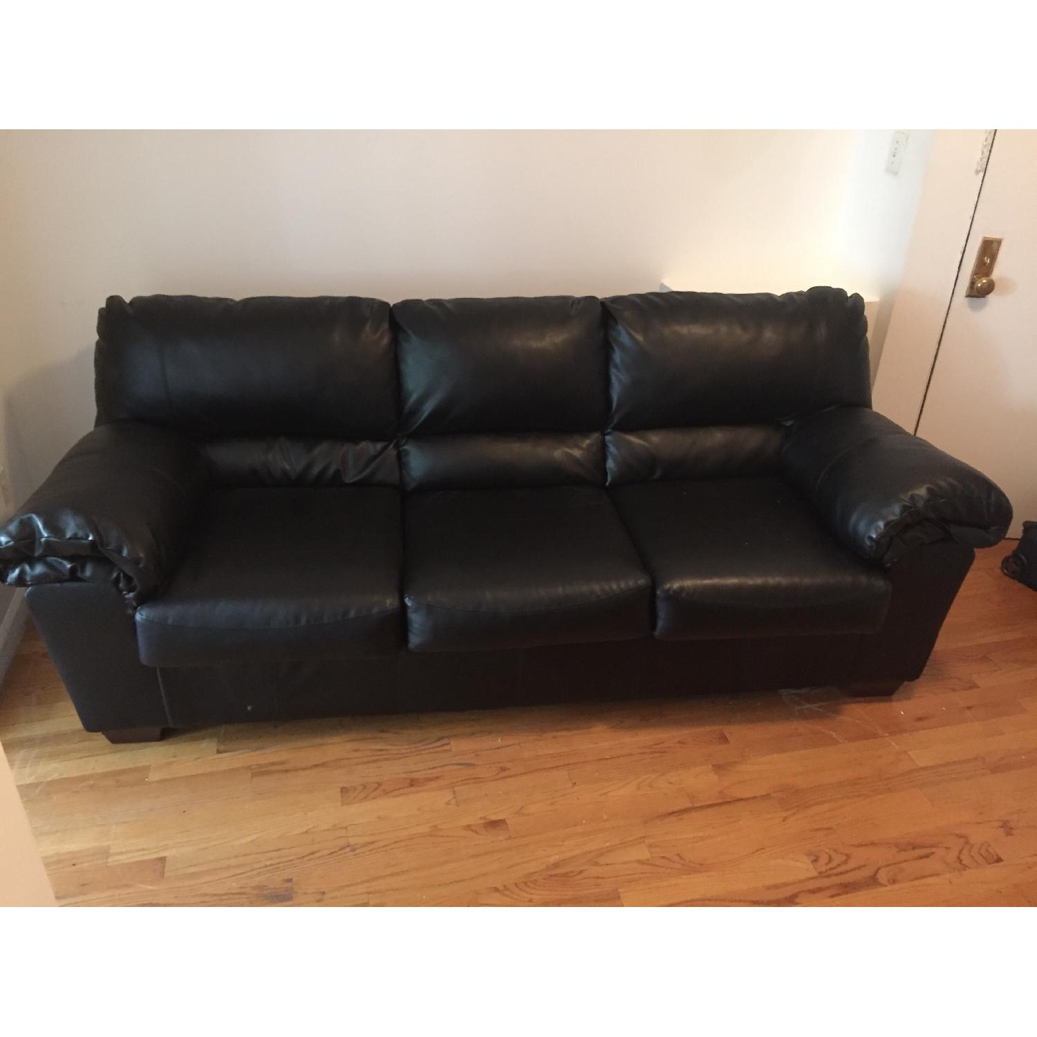 Ashley's Commando Sofa - image-1