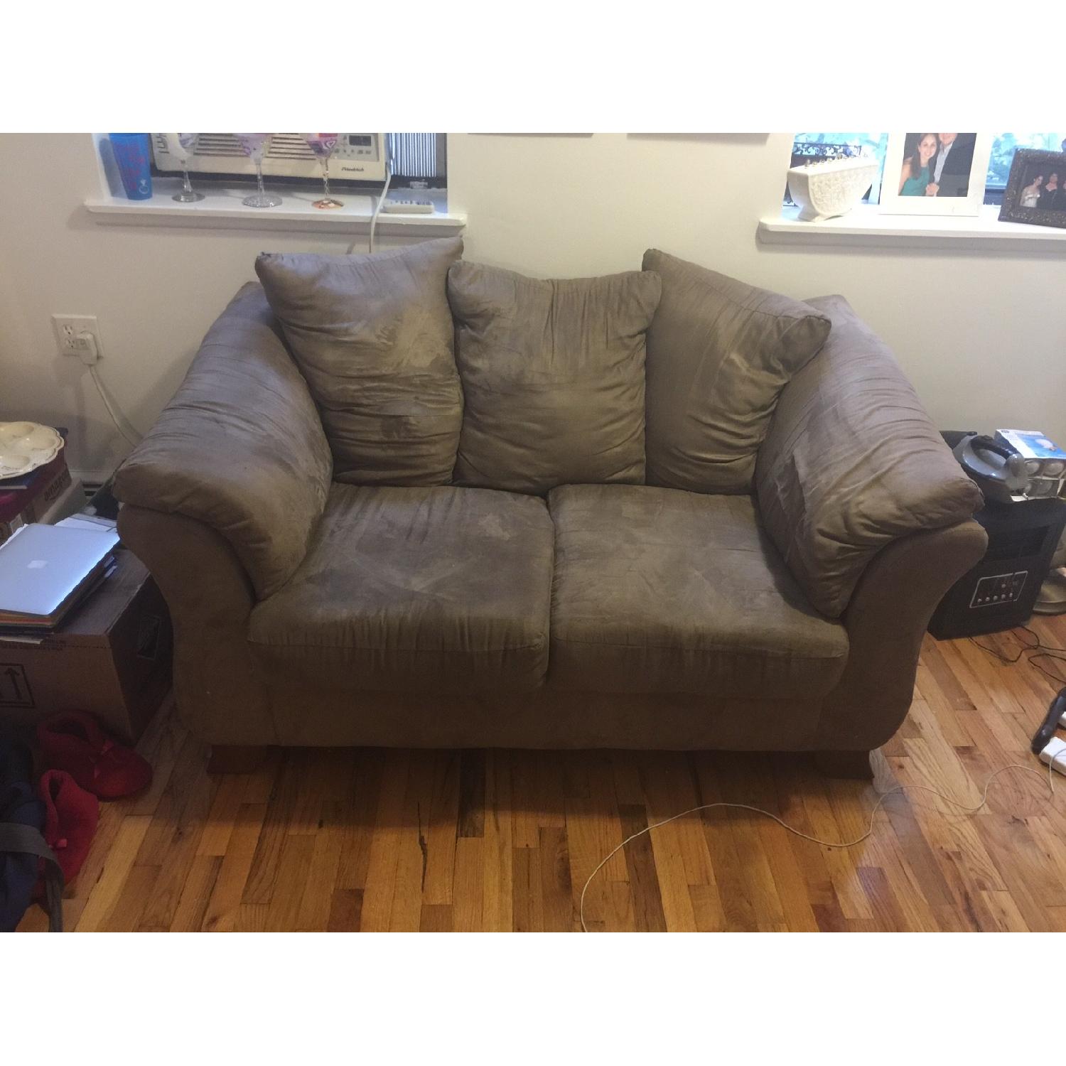 Ashley's Darcy Brown Love Seat - image-1