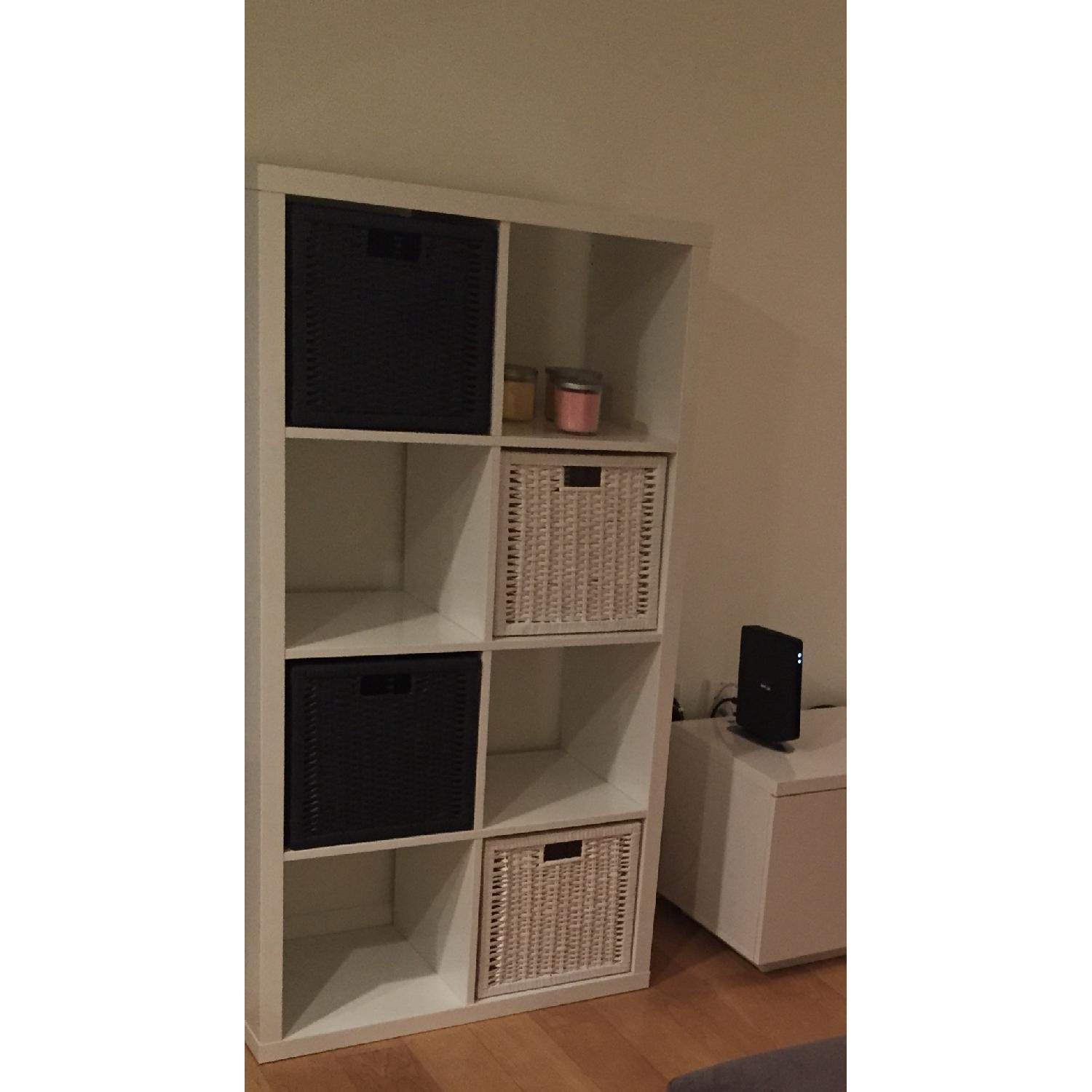 Ikea Kallax Shelving Unit in High Gloss White w/ 4 Baskets - AptDeco