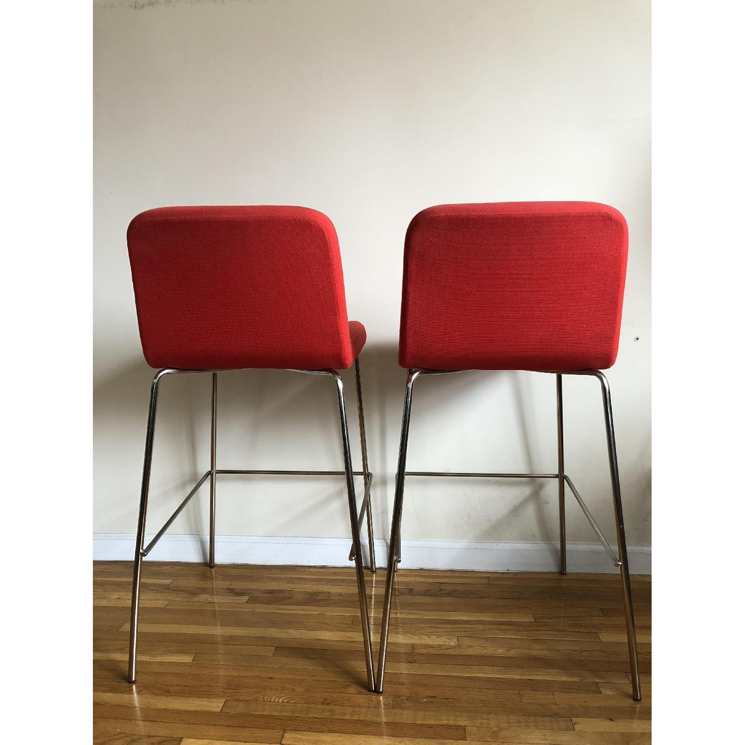CB2 Charlie Red Bar Stools AptDeco