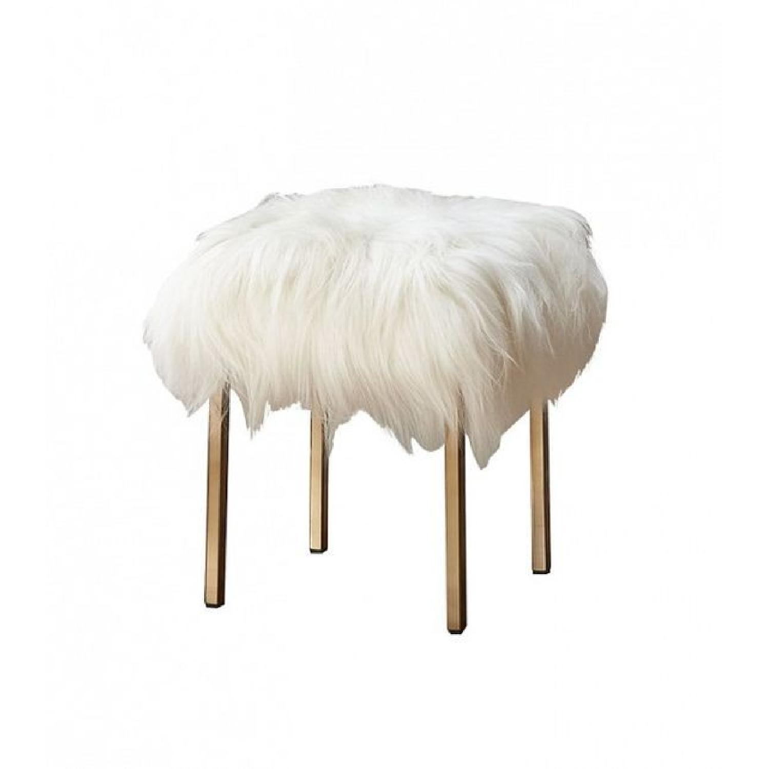 CB2 Fuzzy Sheepskin Stools AptDeco