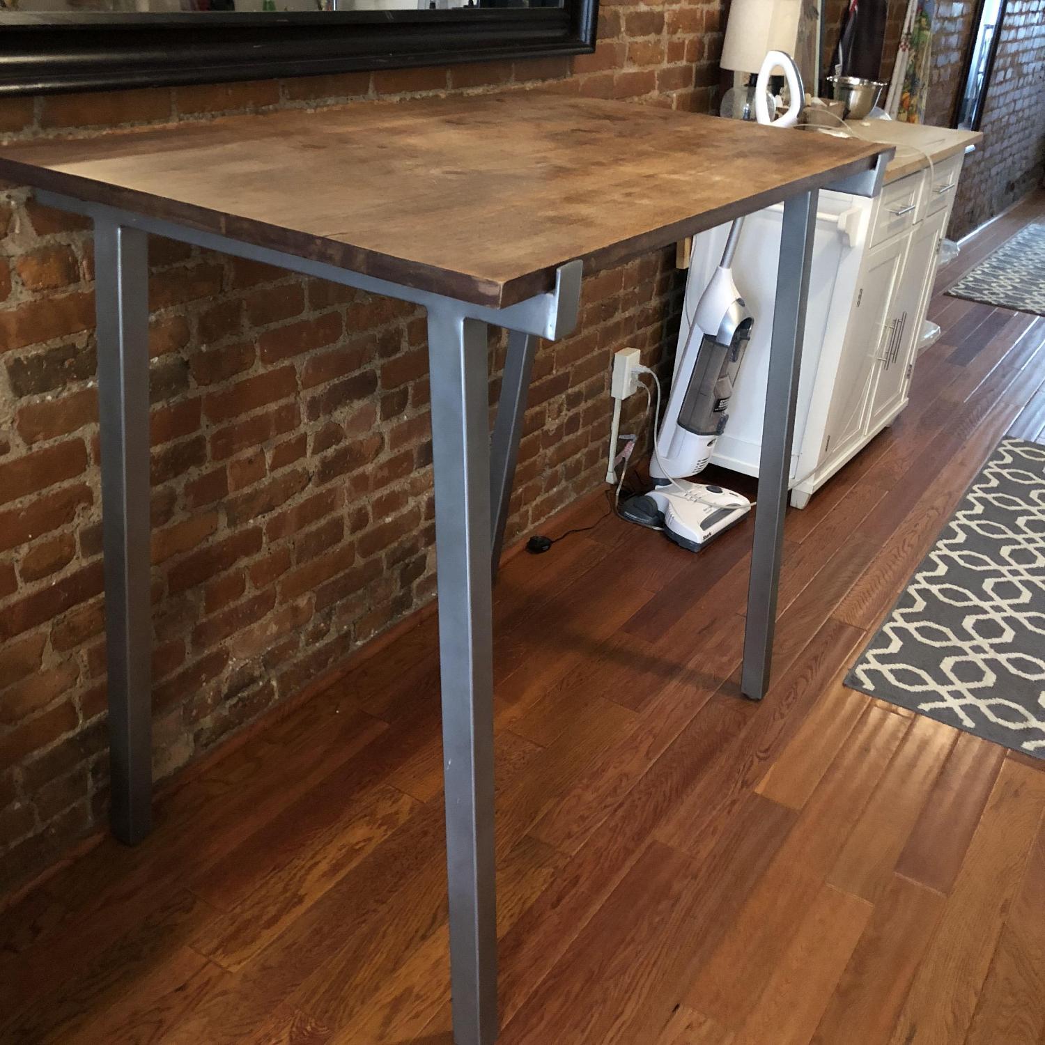 CB2 Stilt Bar Height Dining Table - image-1