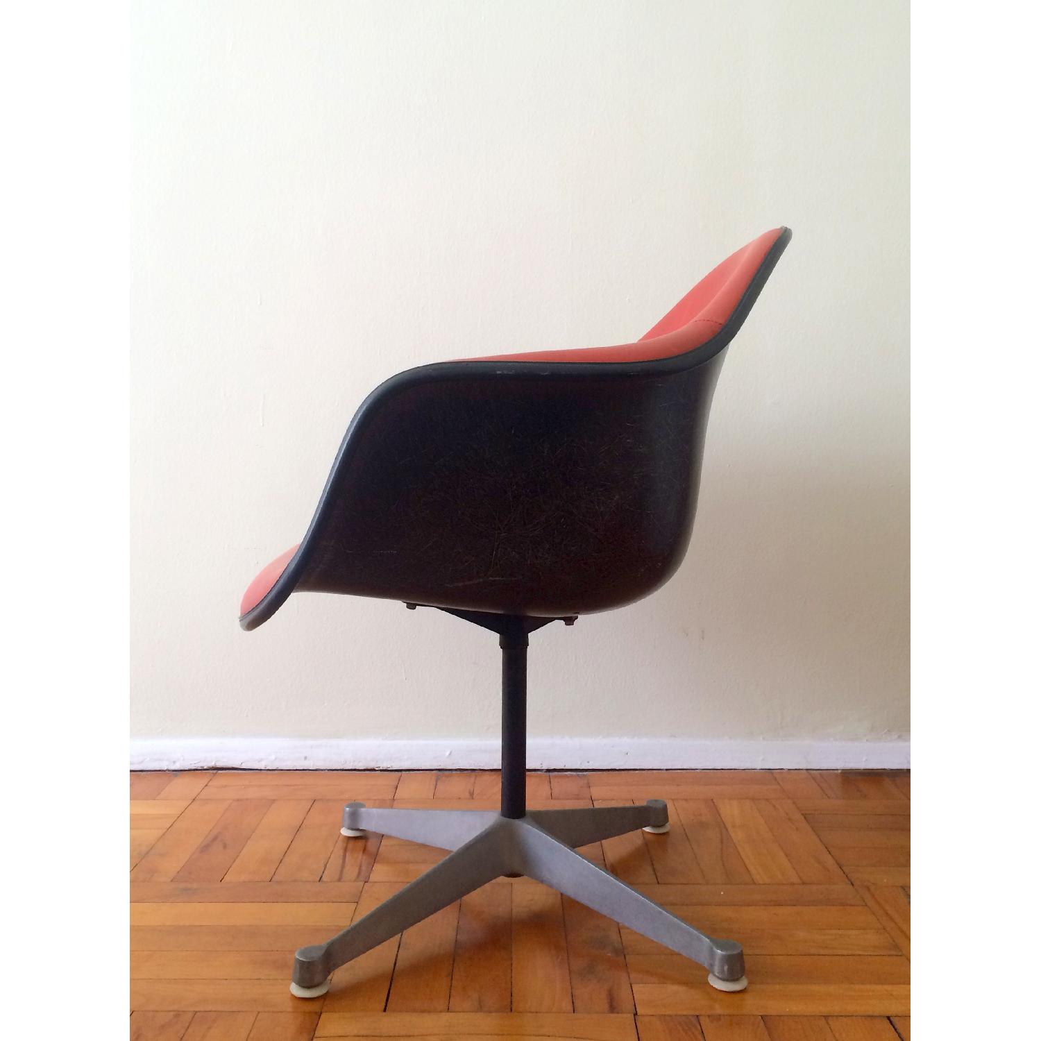 Eames for Herman Miller Orange Swivel Fiberglass Chair - image-2