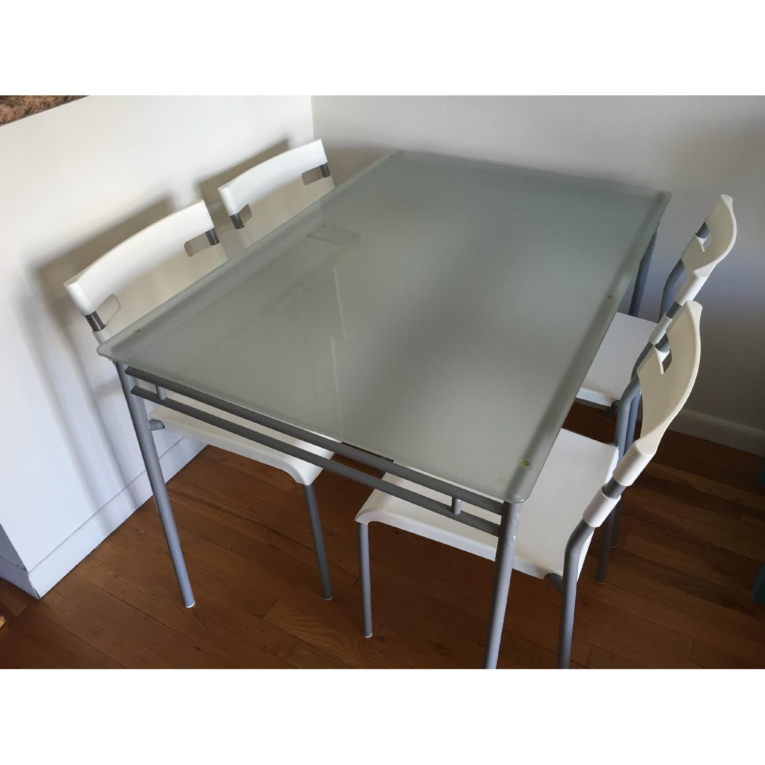 Ikea Glass-Top Table w/ 4 Chairs - AptDeco