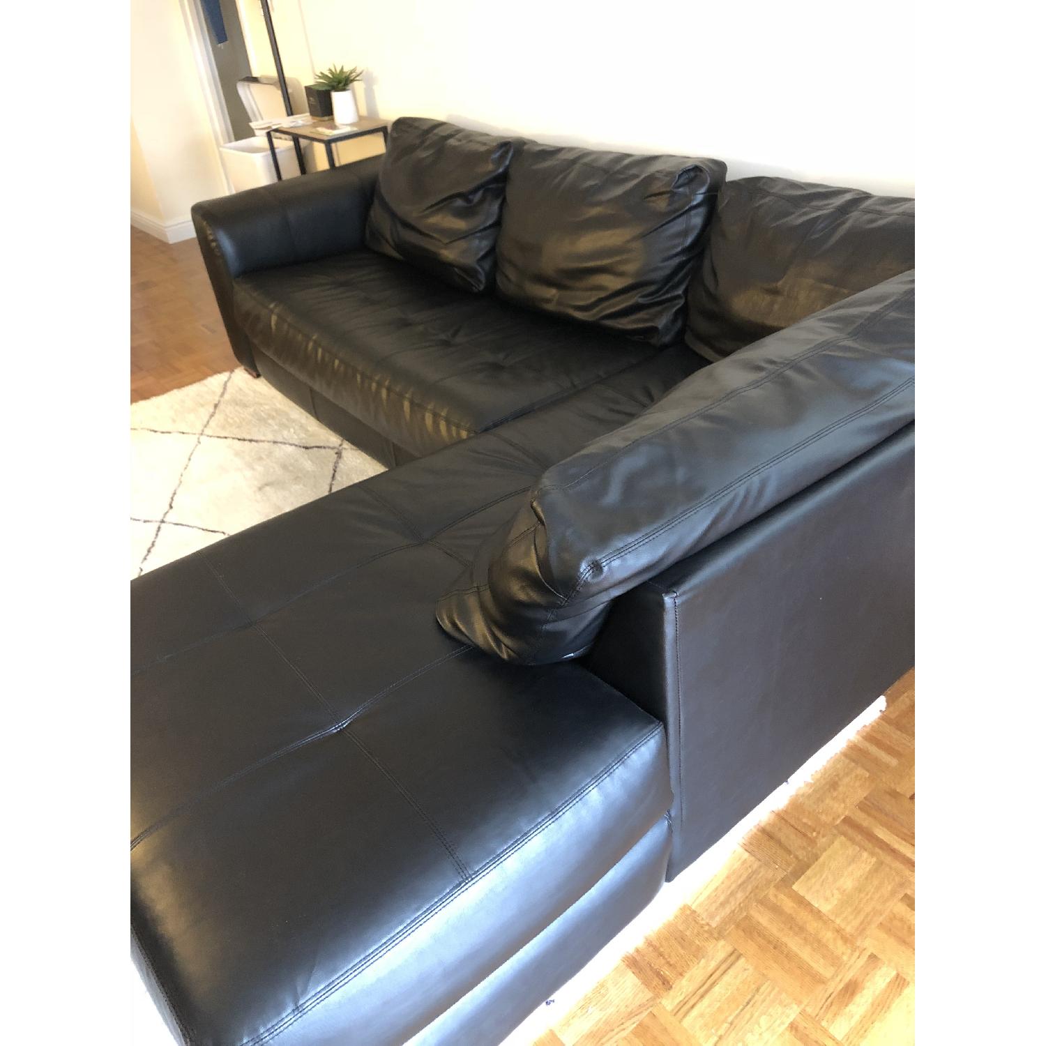 Jennifer Convertibles Black Leather 2Piece Sectional Sofa AptDeco