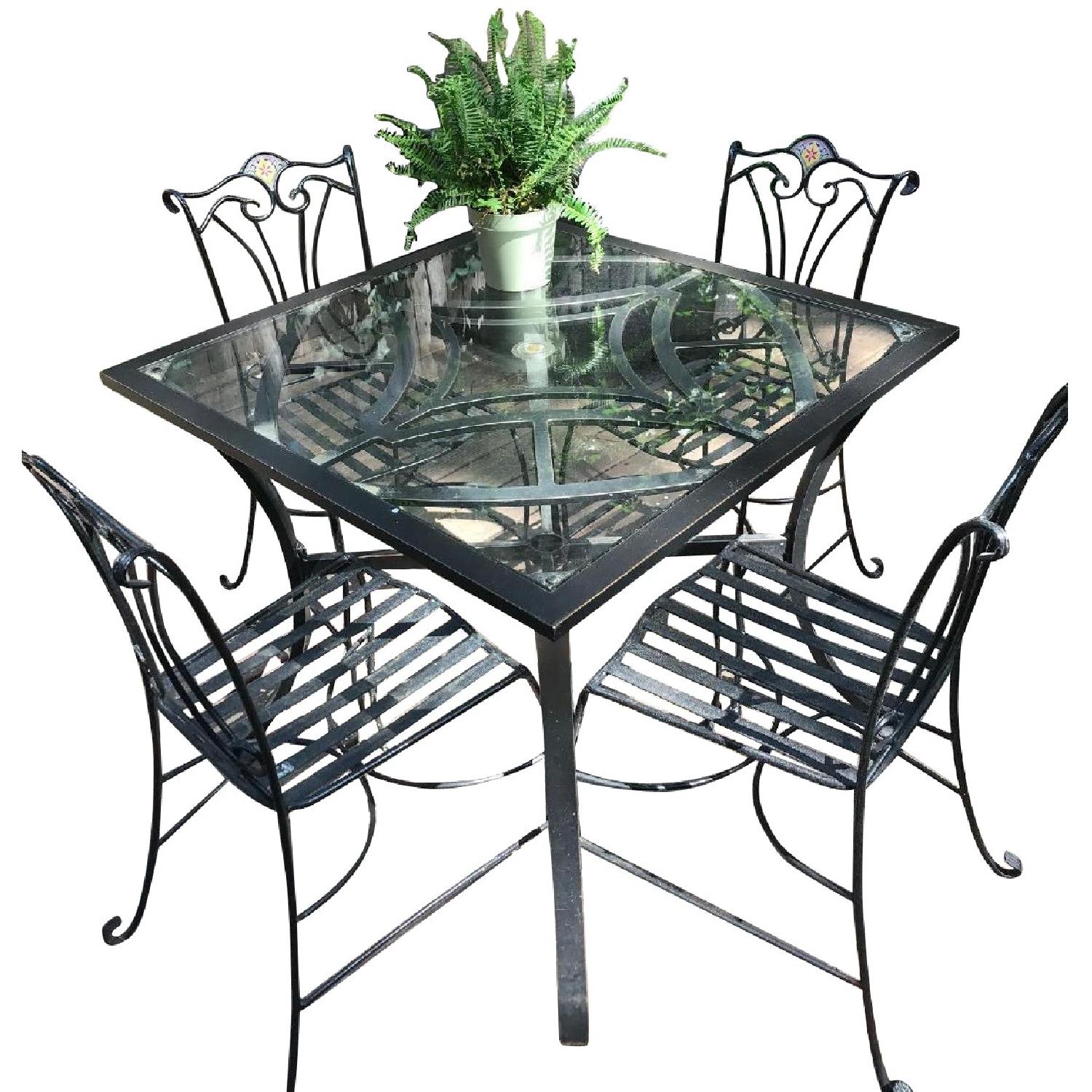 Outdoor Patio Table w/ 4 Wrought Iron Chairs - image-0