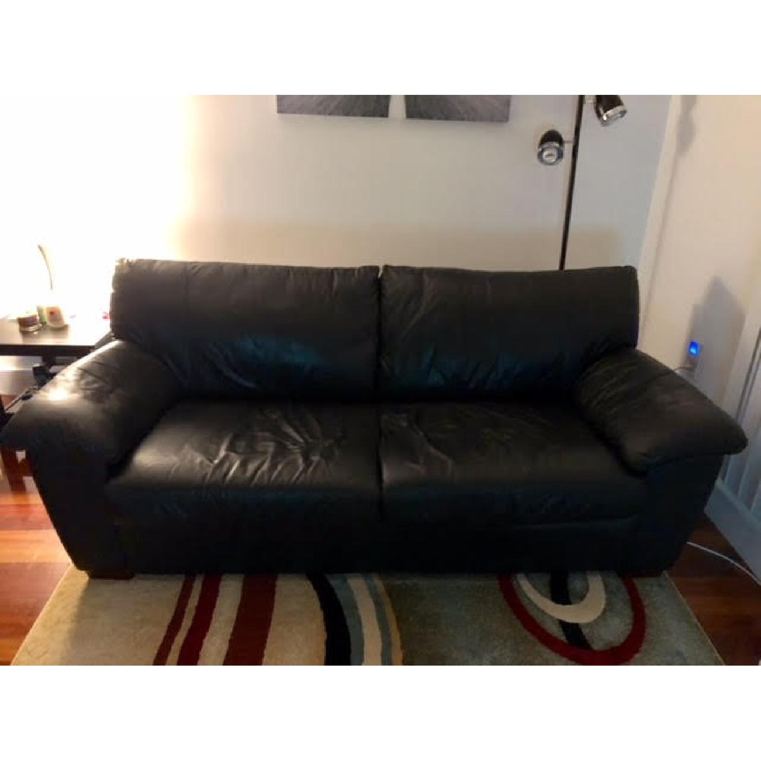 Black Leather Full/Queen Sleeper Sofa & Ottoman - image-1