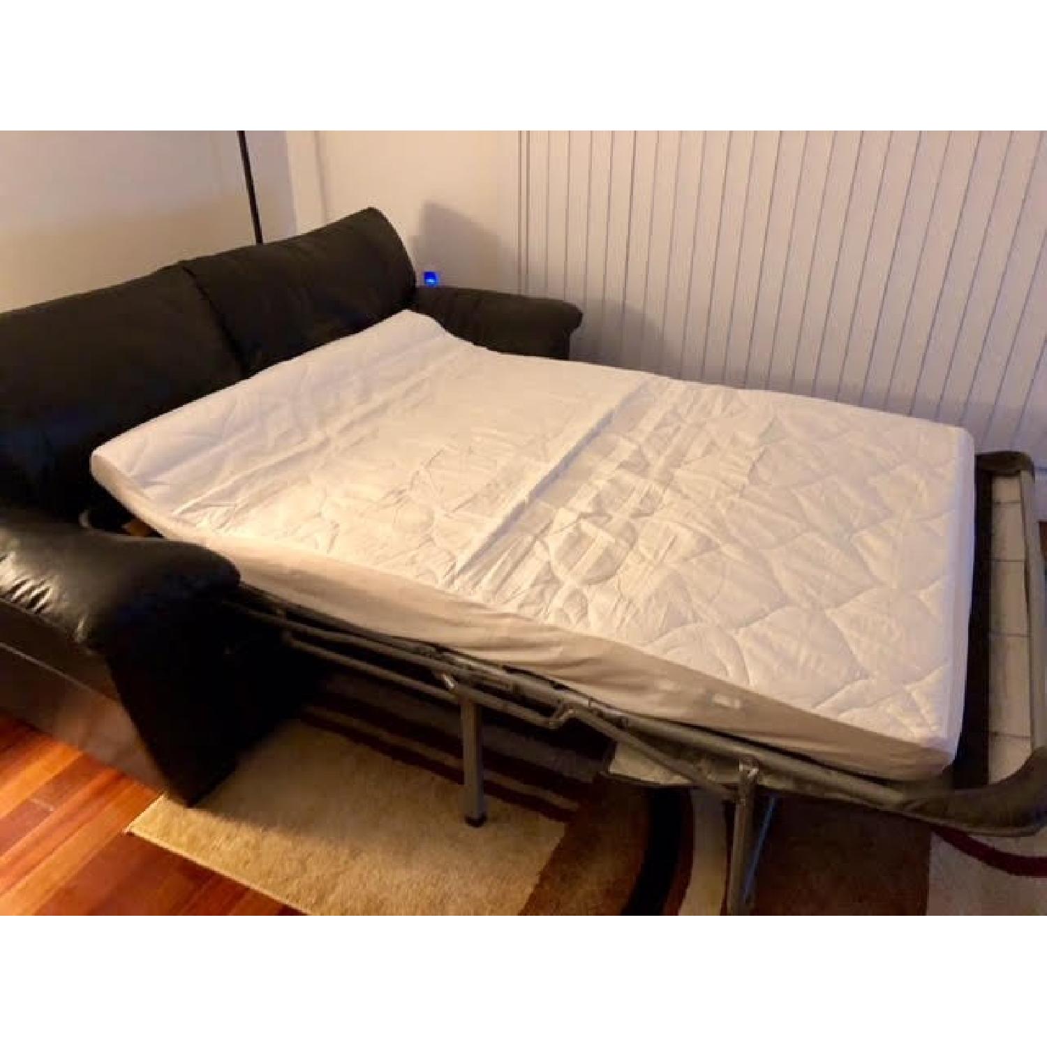 Black Leather Full/Queen Sleeper Sofa & Ottoman - image-2