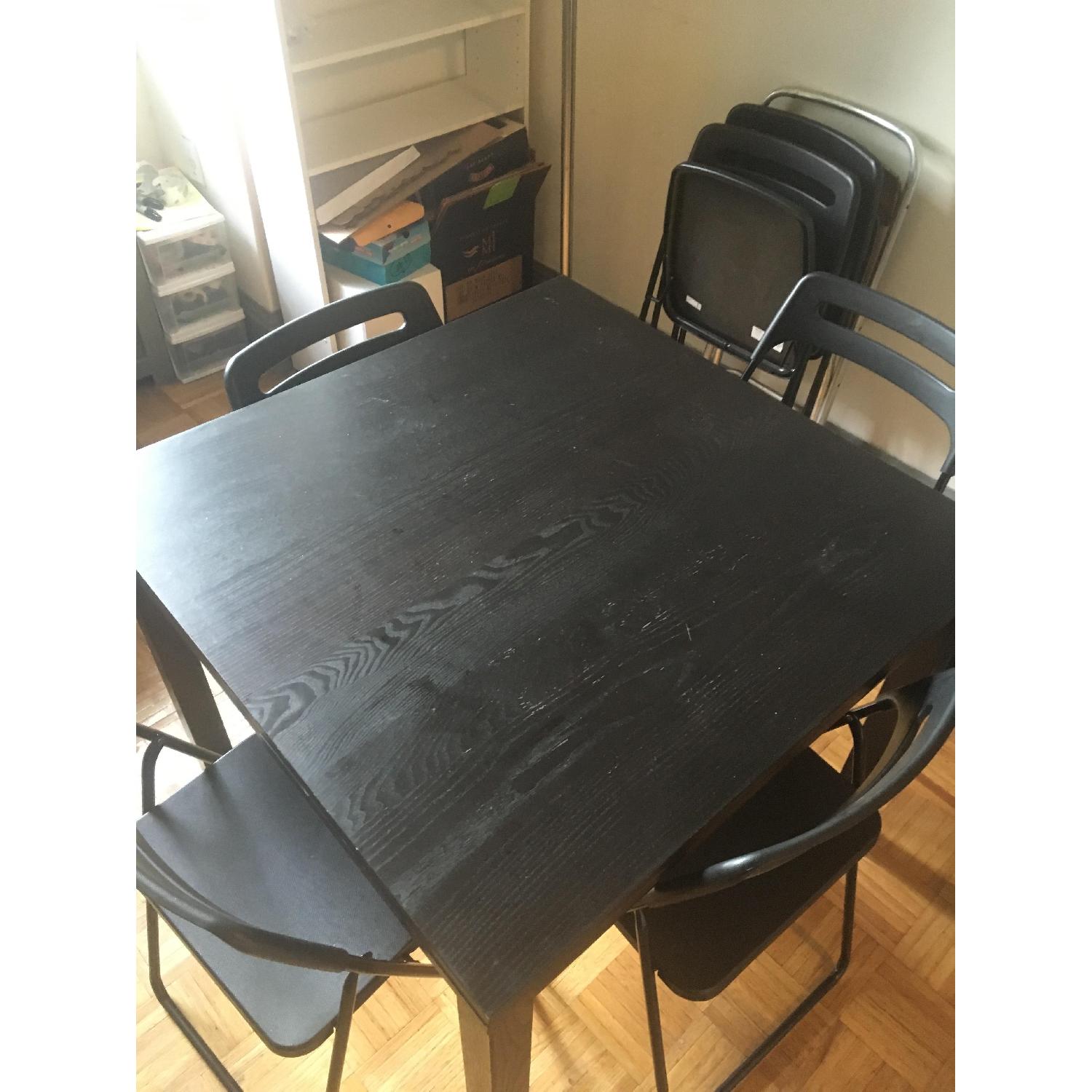 Ikea Bjursta Black Extendable Dining Table AptDeco