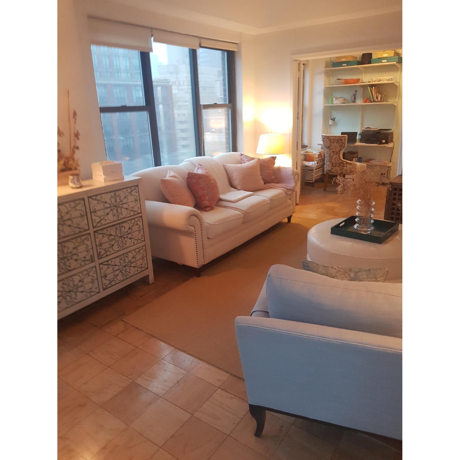 Ethan Allen Modern Round Ottoman in Ivory Leather - image-3