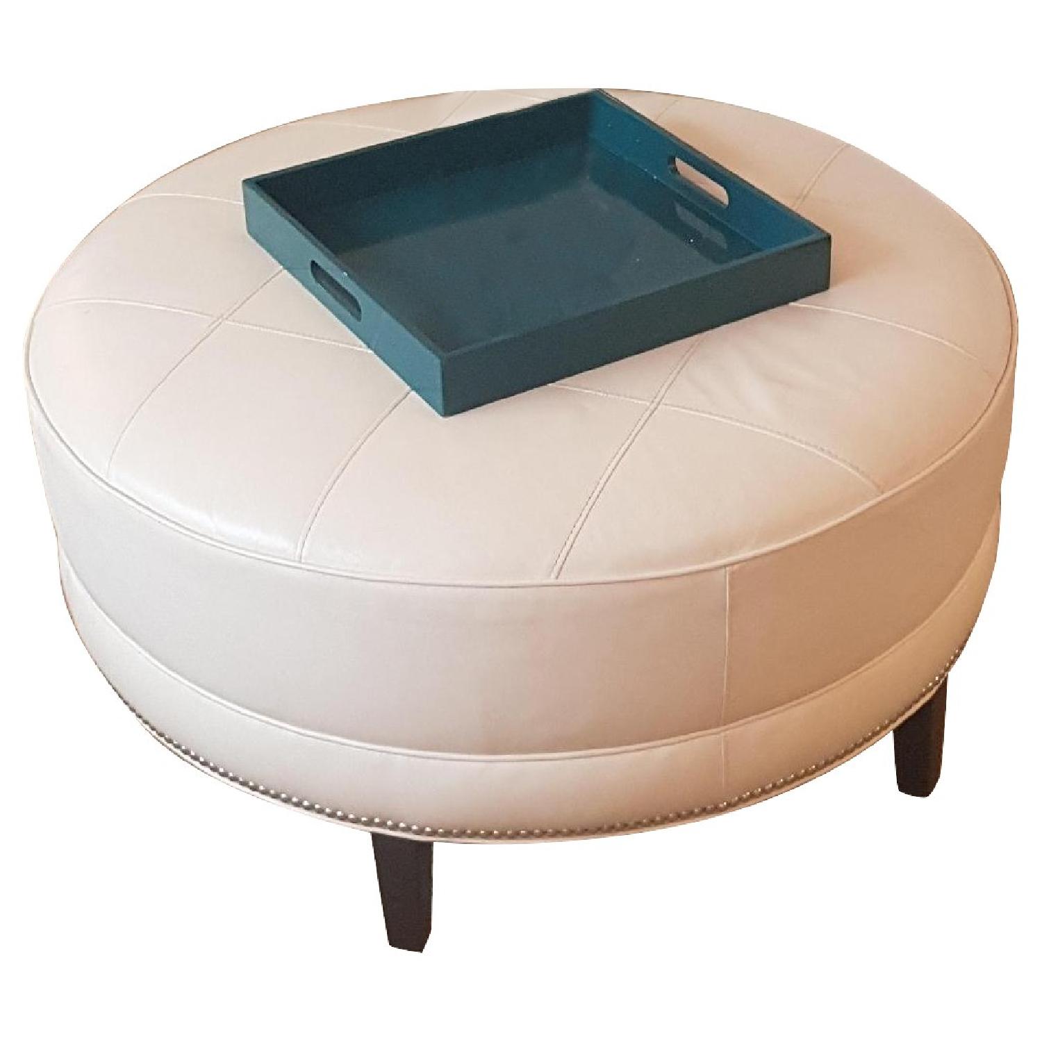 Ethan Allen Modern Round Ottoman in Ivory Leather - image-0