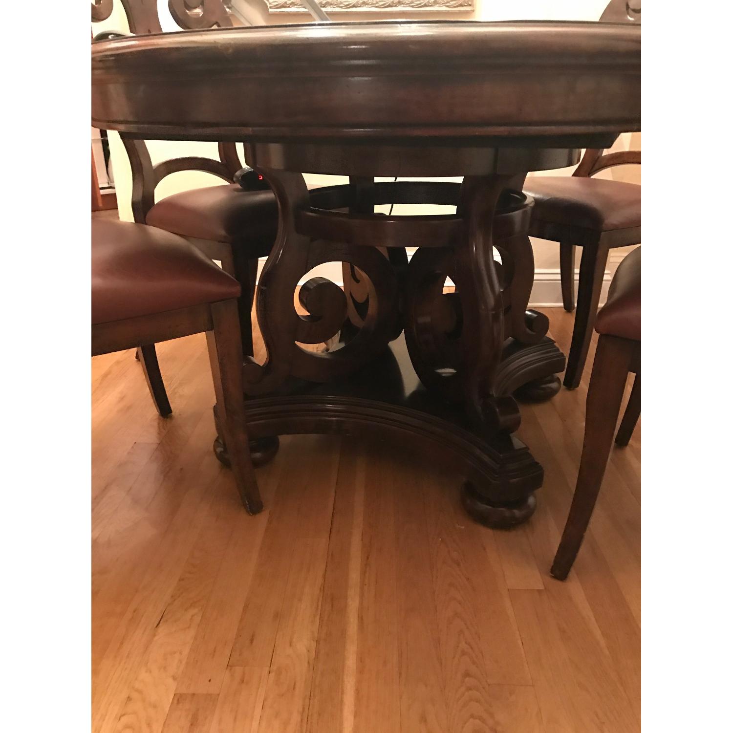 Solid Oak Extendable Dining Table w/ 4 Leather Chairs - AptDeco