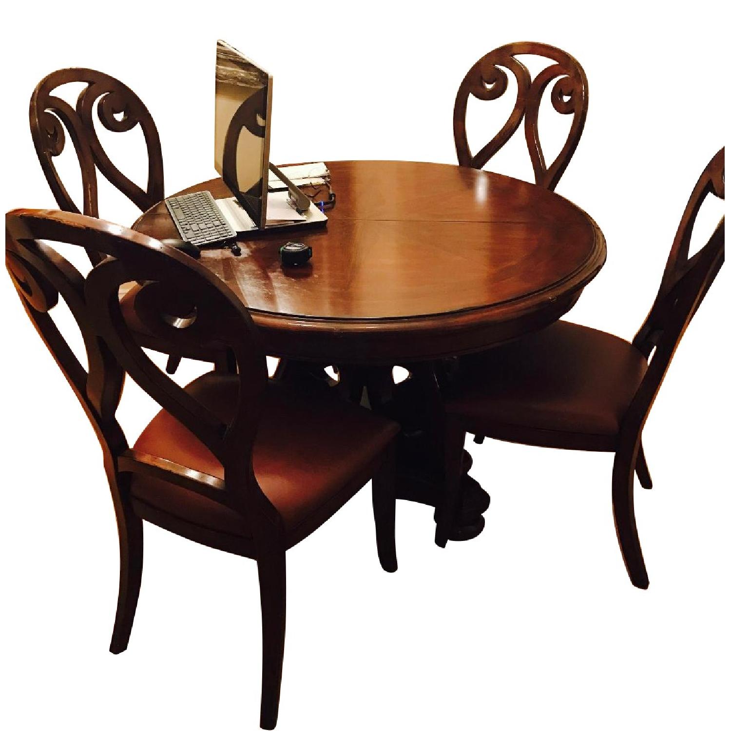 Solid Oak Extendable Dining Table w/ 4 Leather Chairs - AptDeco