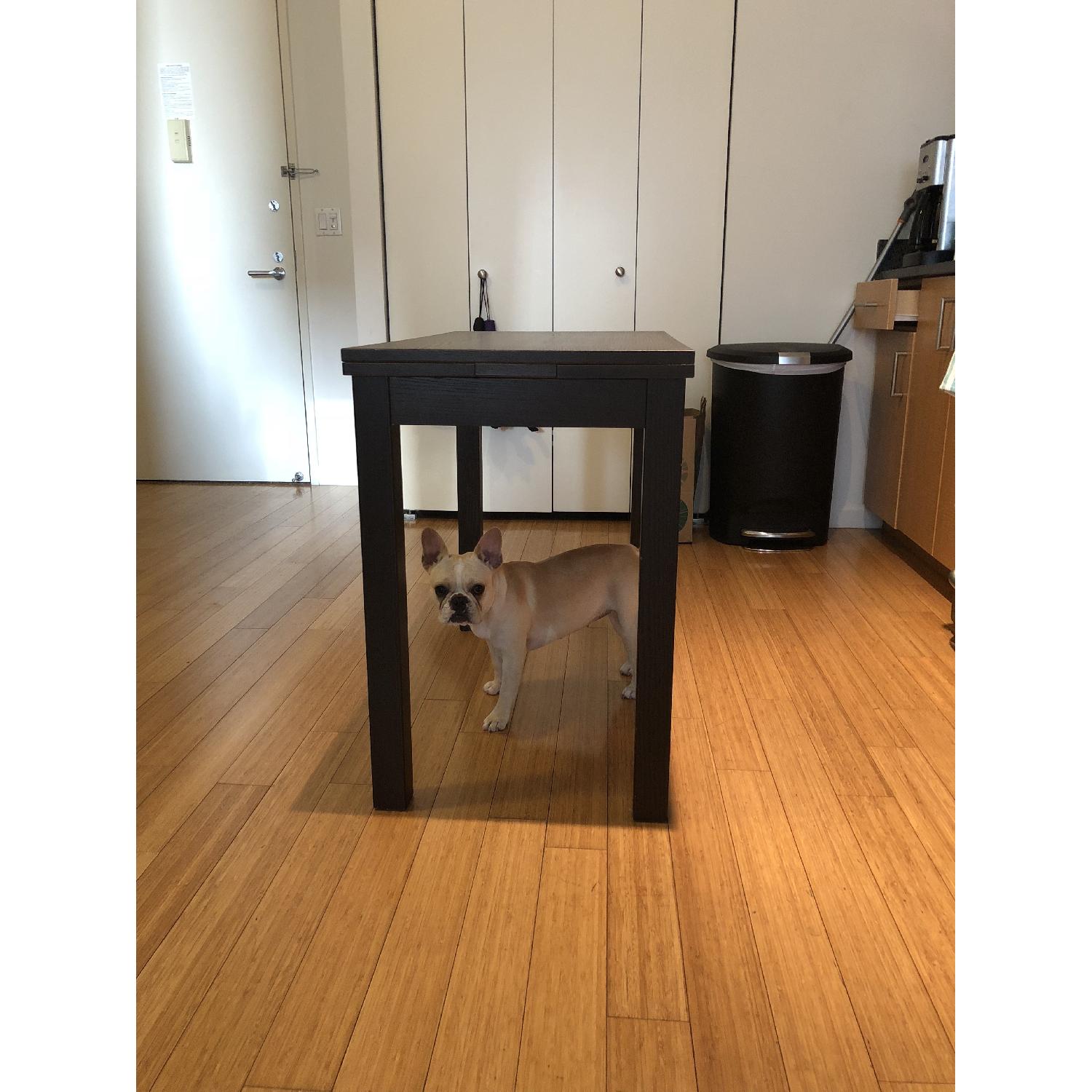 Ikea Bjursta Rectangle to Square Extendable Dining Table - image-4