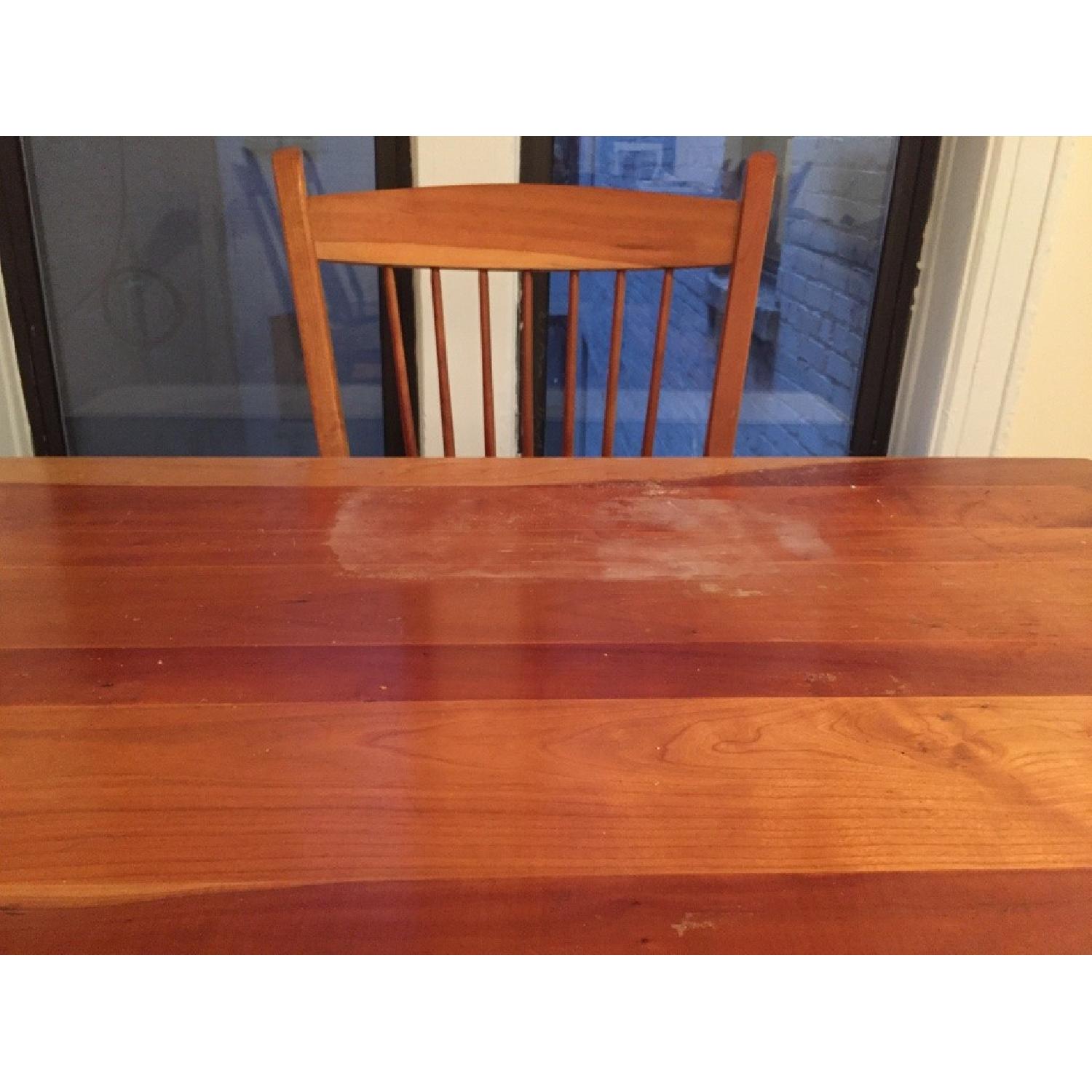 Expandable Cherry Table w/ 6 Chairs - AptDeco