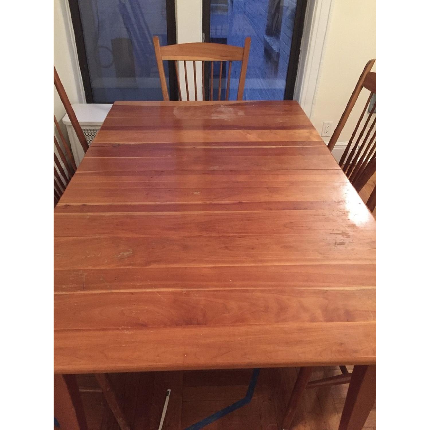 Expandable Cherry Table w/ 6 Chairs - AptDeco