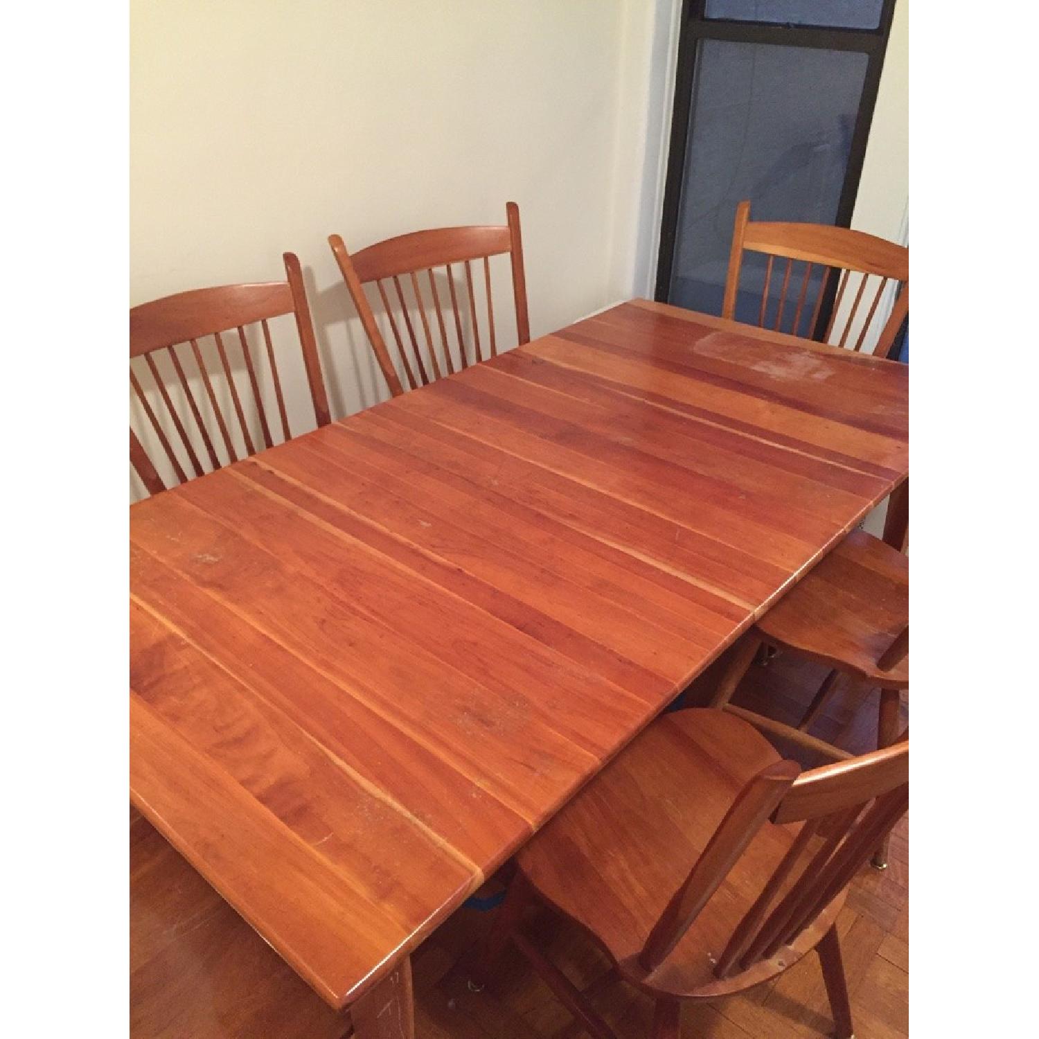 Expandable Cherry Table w/ 6 Chairs - AptDeco
