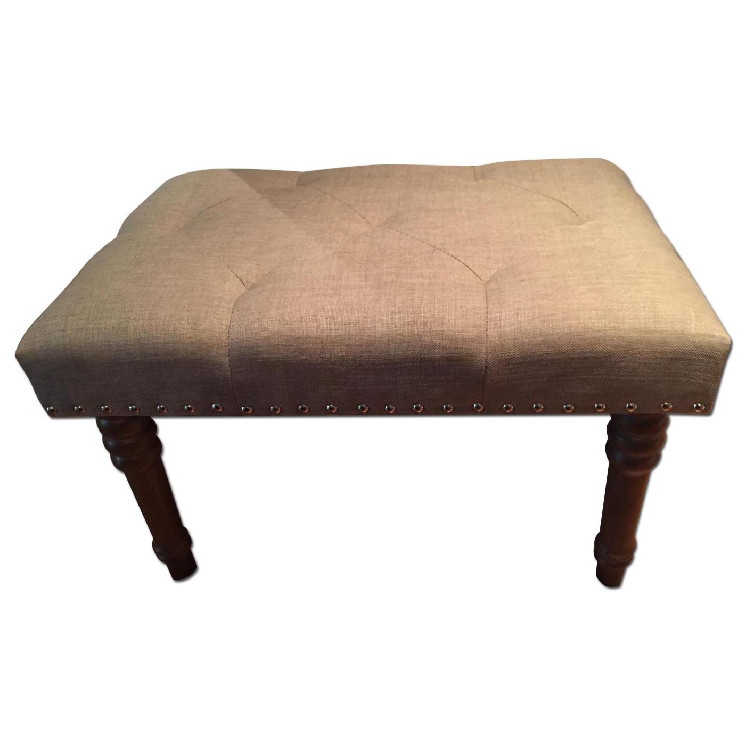 HomeGoods Tufted Cream Linen Ottoman/Footstool - image-0