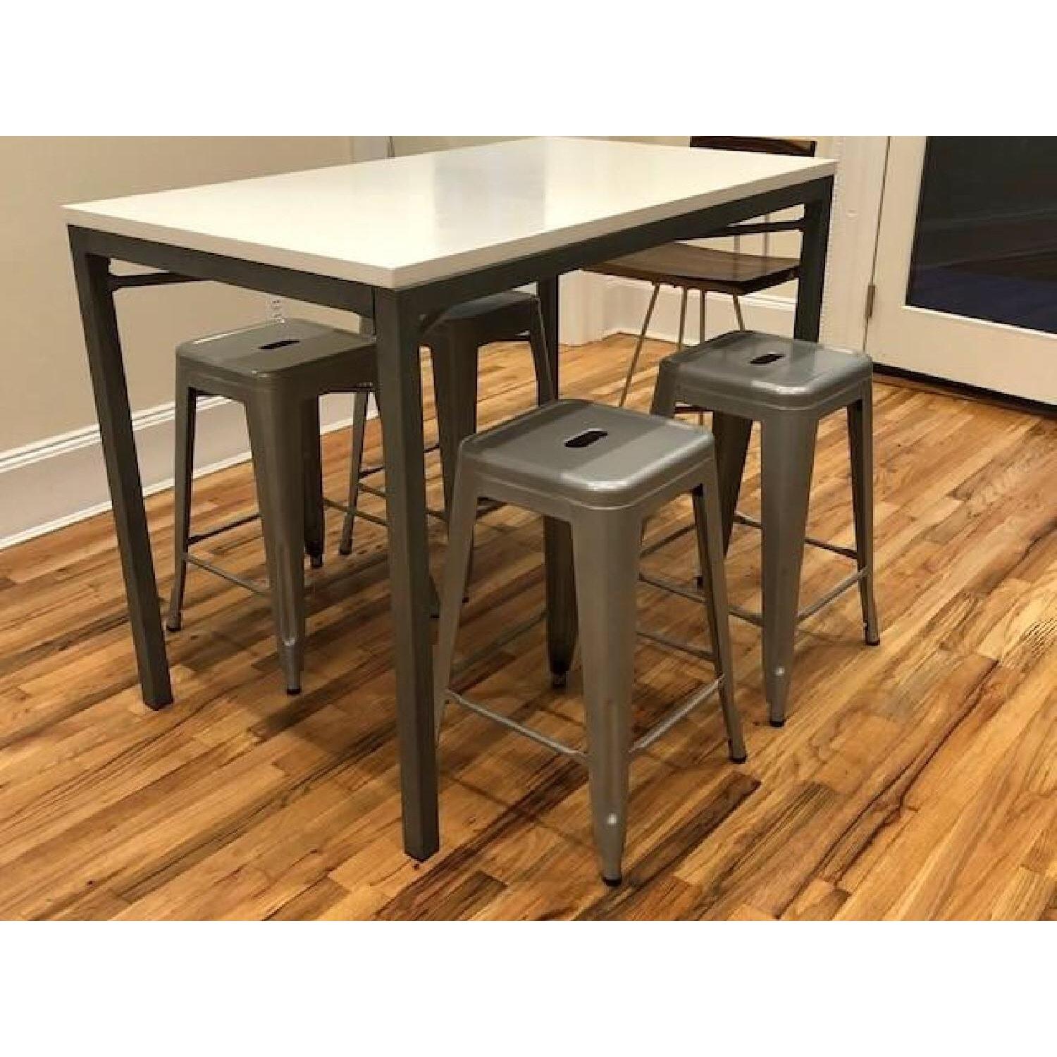 Crate & Barrel Parsons White Top/Zinc Base High Dining Table AptDeco