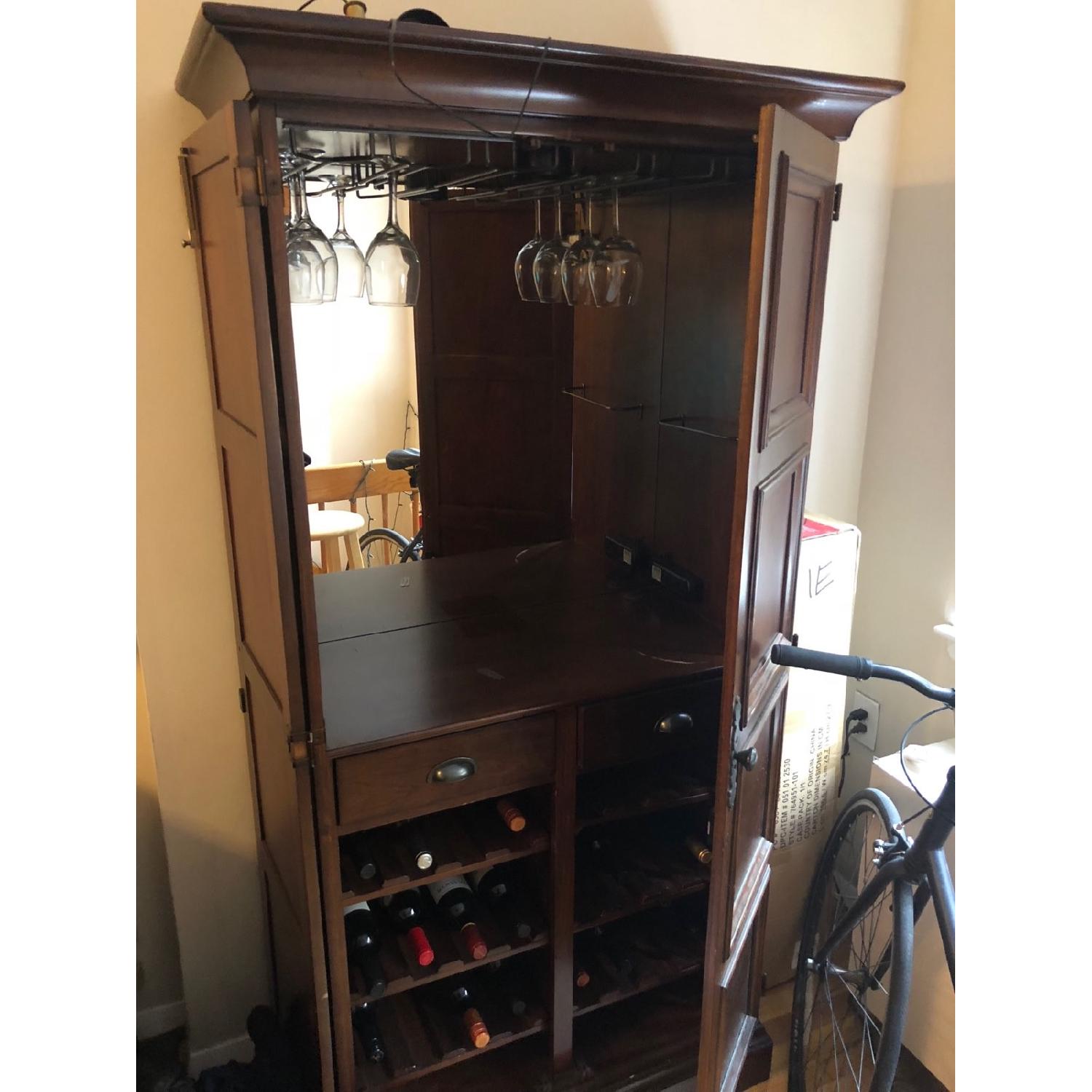 Howard Miller Ridgeville Hide a Bar Wine Cabinet - image-1